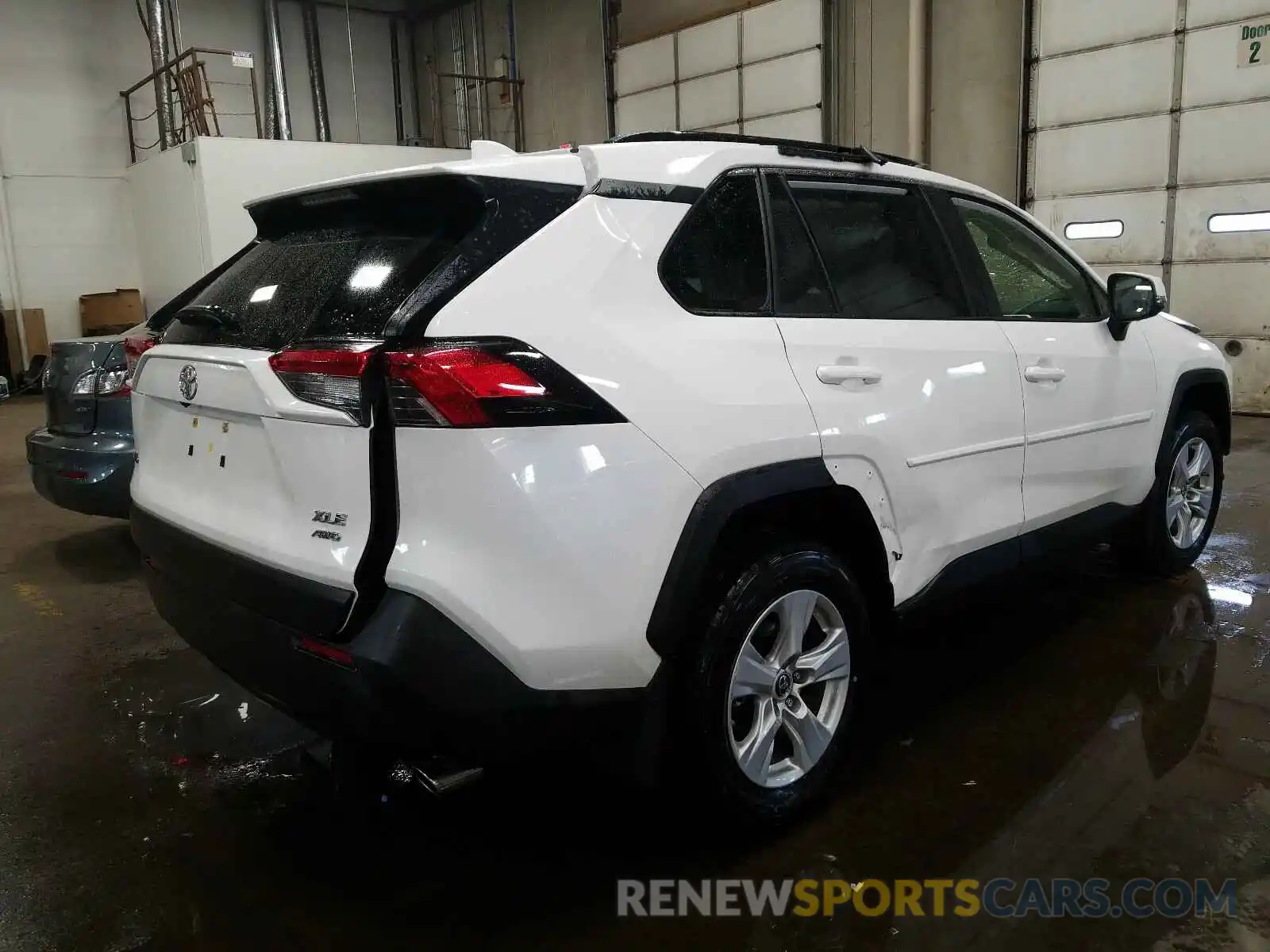 4 Photograph of a damaged car JTMP1RFV4KD023215 TOYOTA RAV4 2019