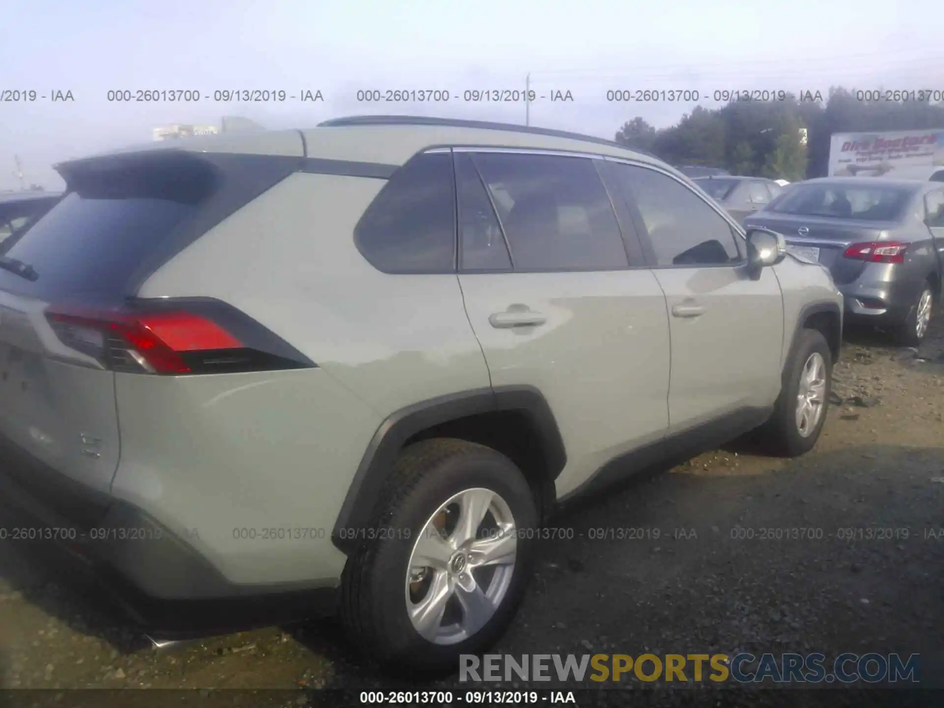 4 Photograph of a damaged car JTMP1RFV4KD027765 TOYOTA RAV4 2019