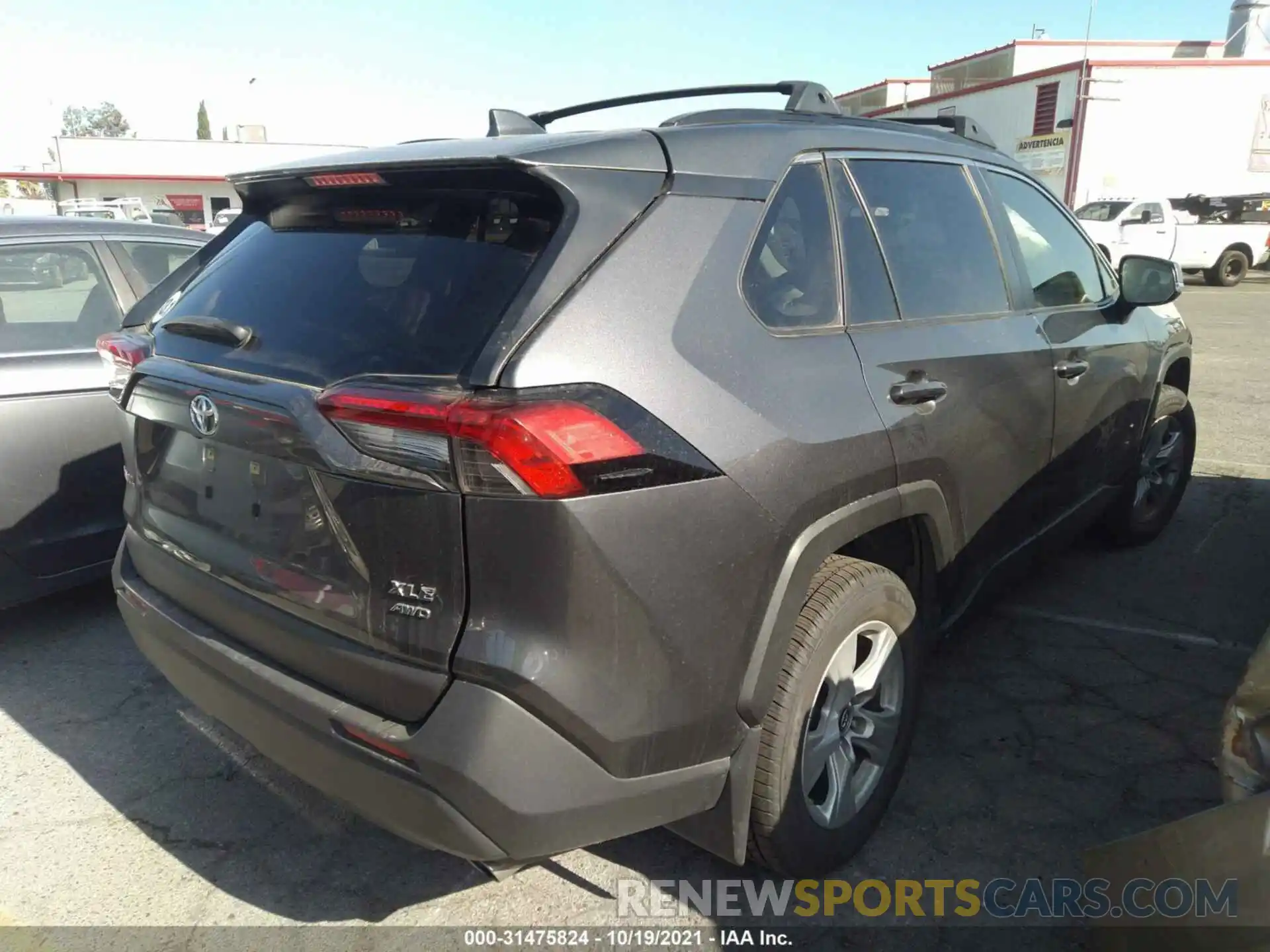 4 Photograph of a damaged car JTMP1RFV4KD028625 TOYOTA RAV4 2019