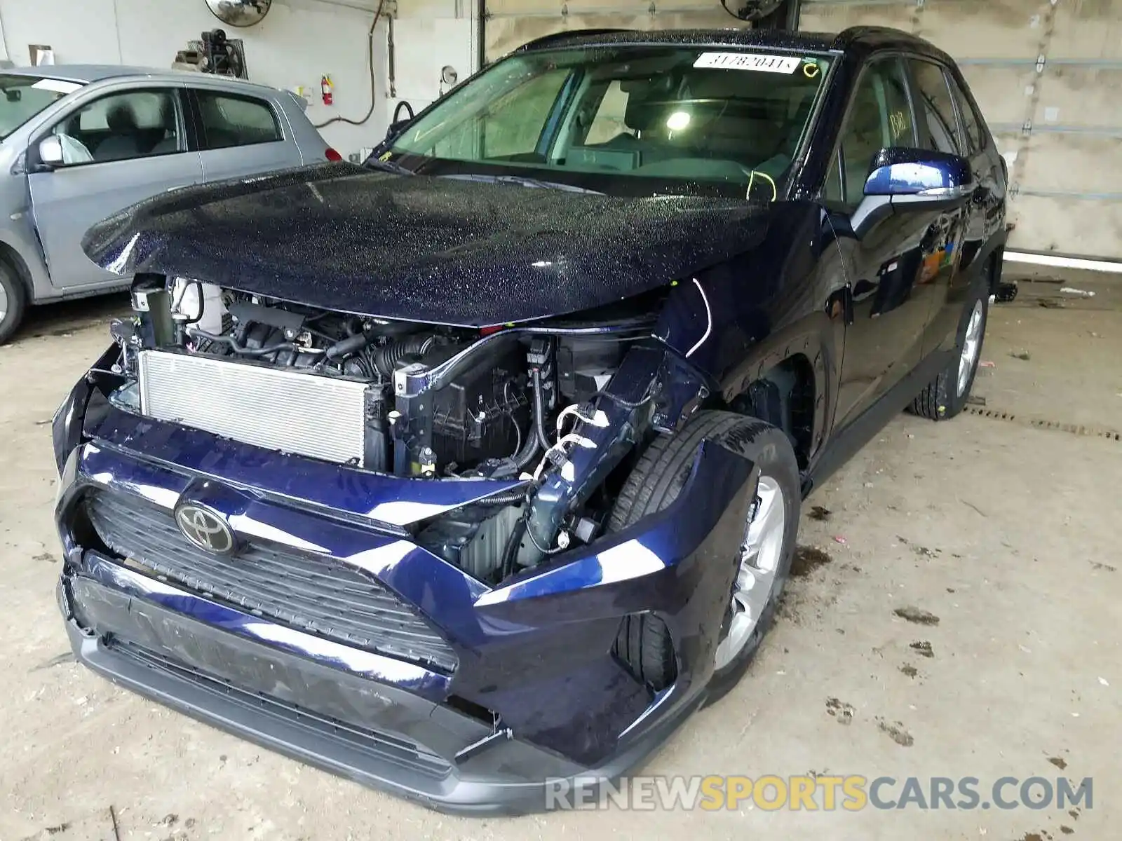 2 Photograph of a damaged car JTMP1RFV4KD033159 TOYOTA RAV4 2019