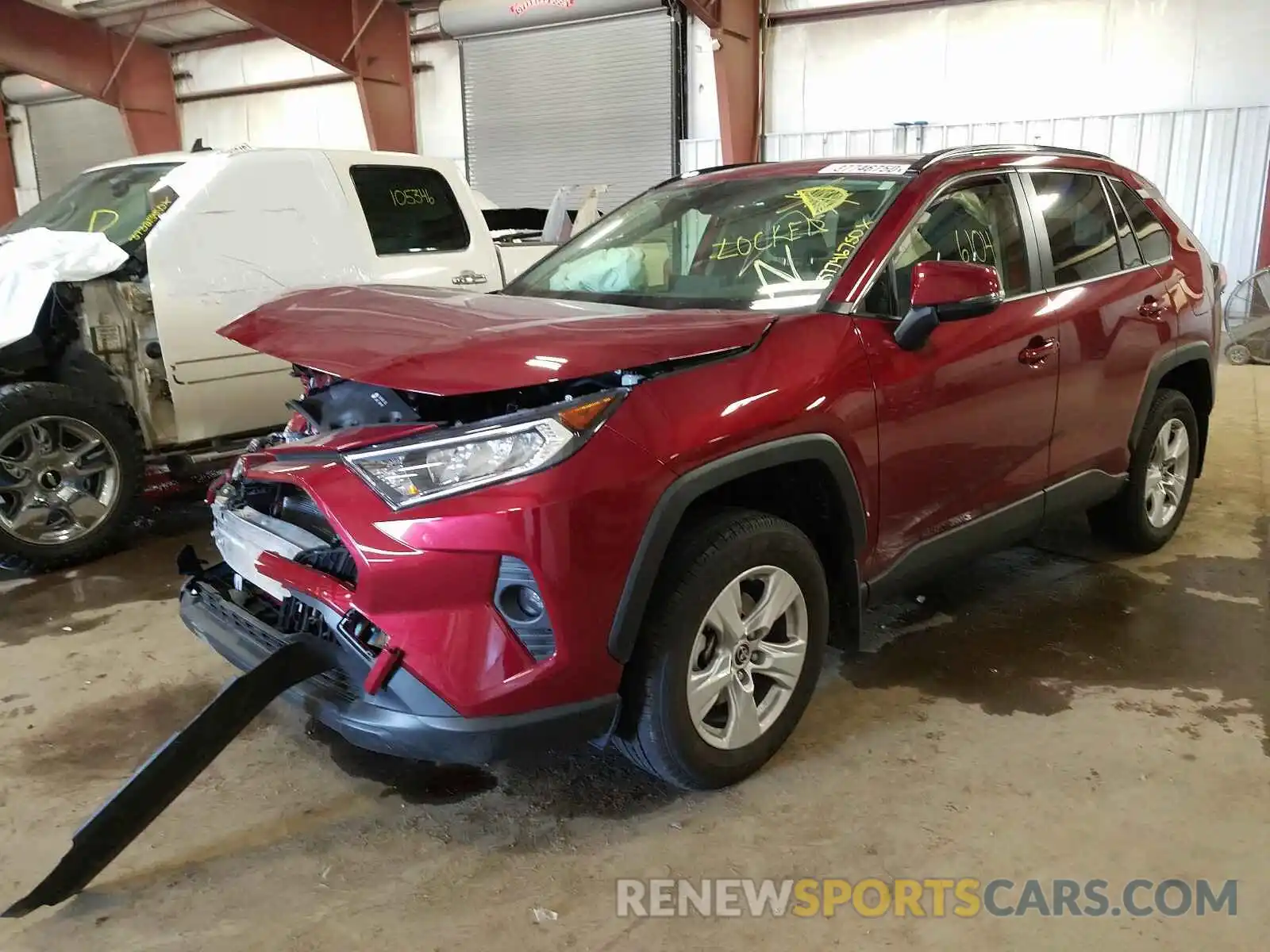 2 Photograph of a damaged car JTMP1RFV4KD038121 TOYOTA RAV4 2019