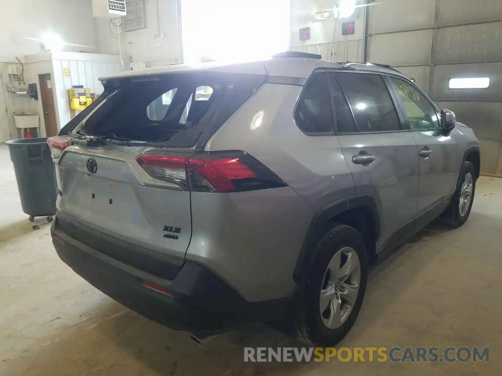 4 Photograph of a damaged car JTMP1RFV4KD039379 TOYOTA RAV4 2019