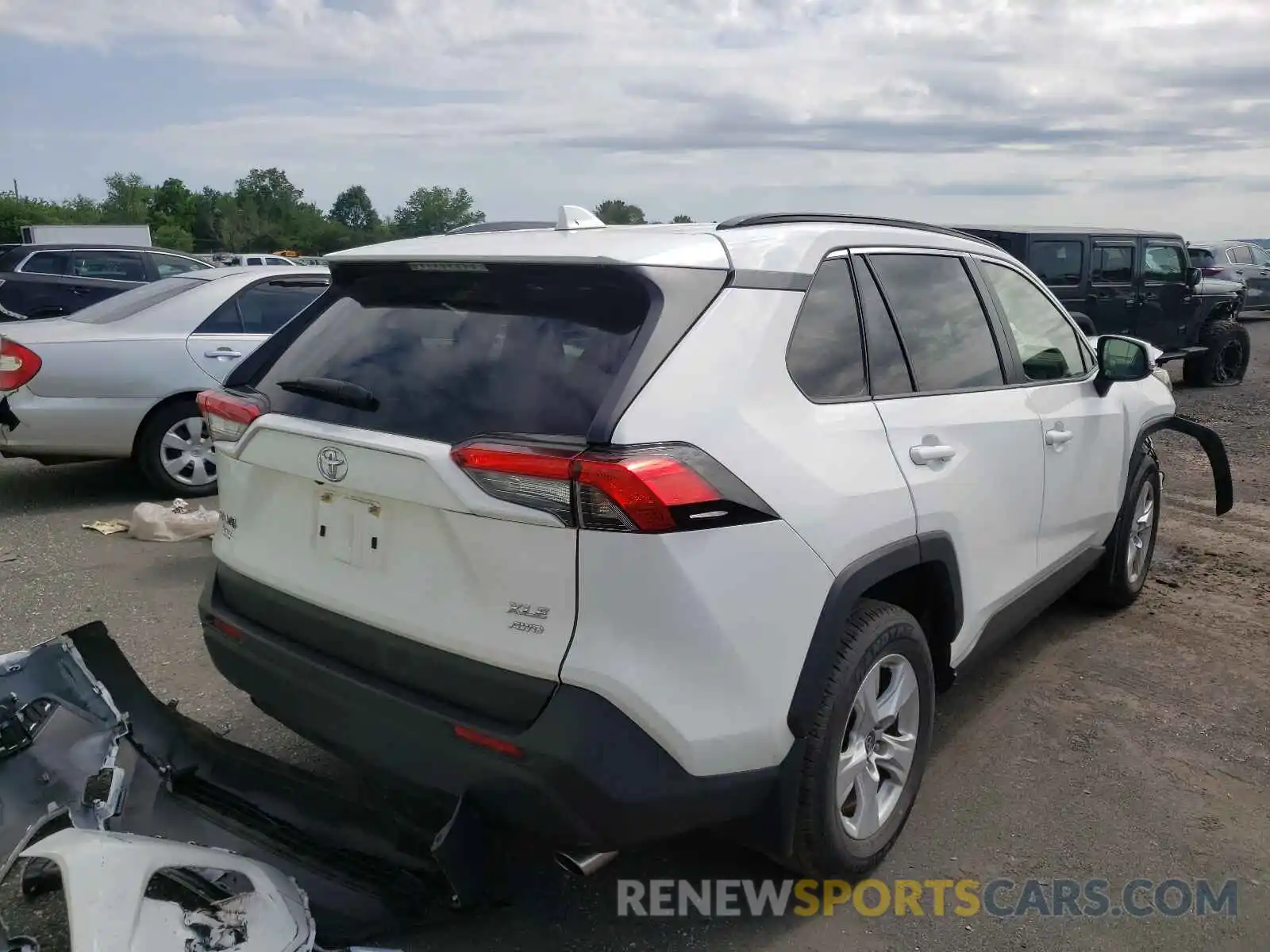 4 Photograph of a damaged car JTMP1RFV4KD041049 TOYOTA RAV4 2019