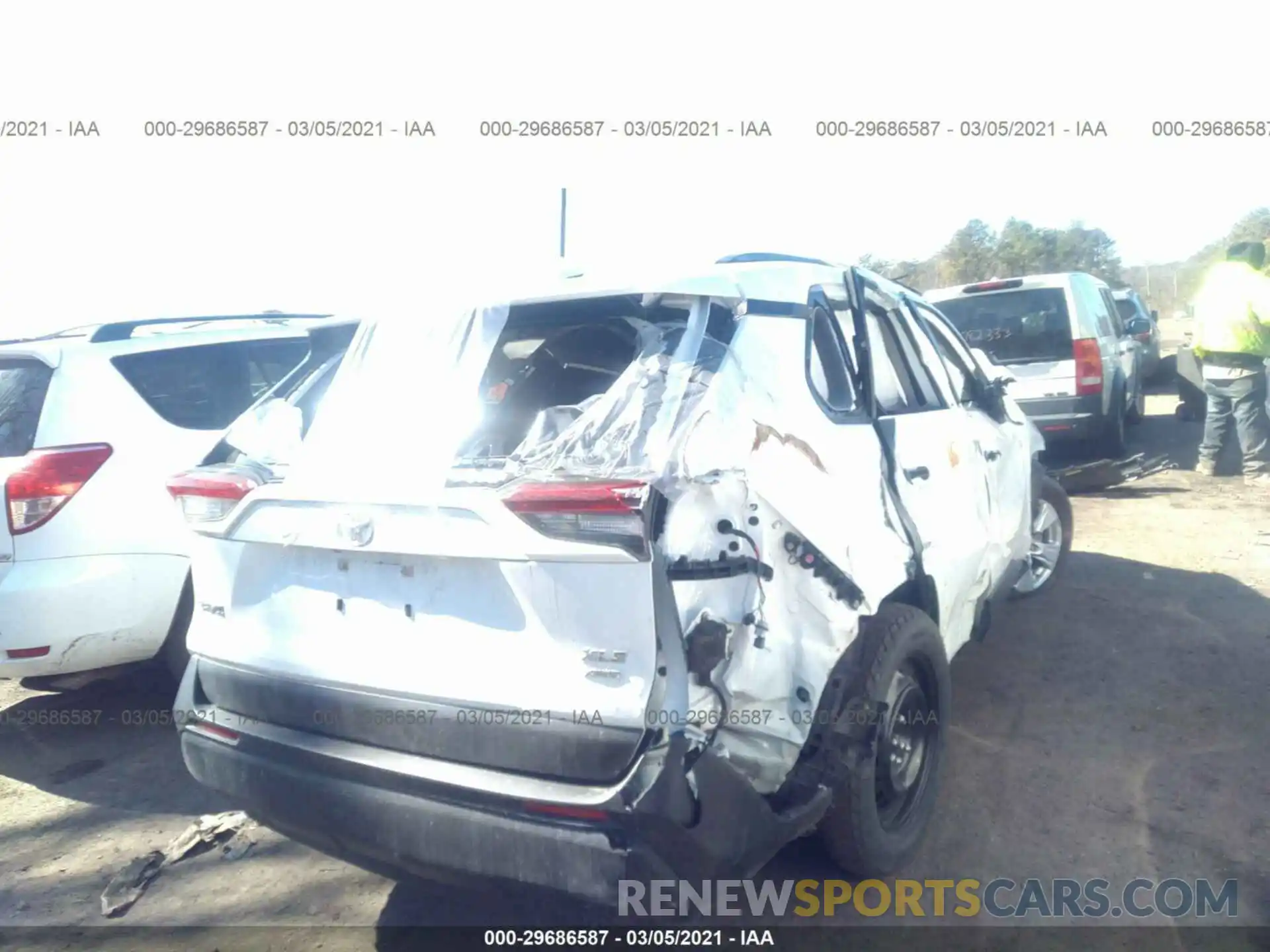 4 Photograph of a damaged car JTMP1RFV4KD041133 TOYOTA RAV4 2019