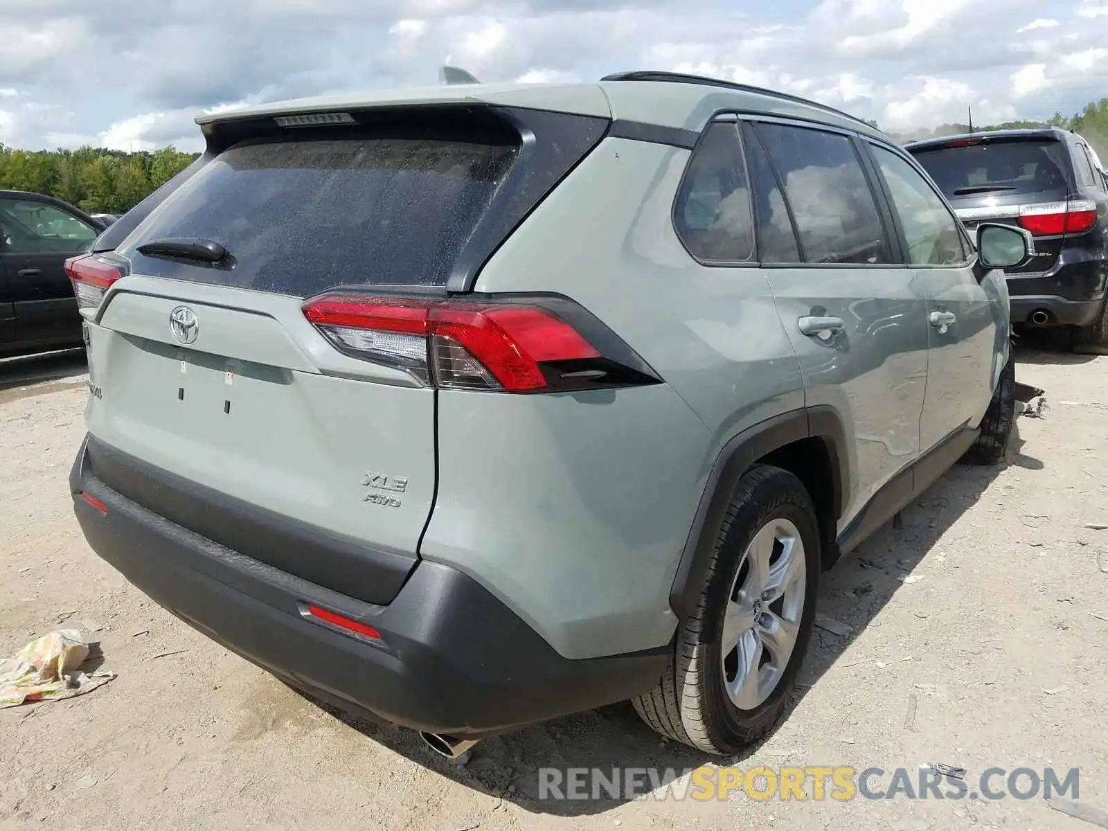 4 Photograph of a damaged car JTMP1RFV4KD506297 TOYOTA RAV4 2019