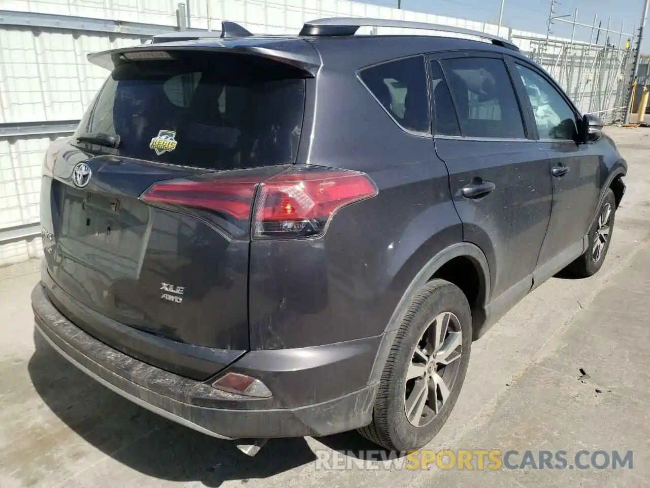 4 Photograph of a damaged car JTMP1RFV4KD517896 TOYOTA RAV4 2019