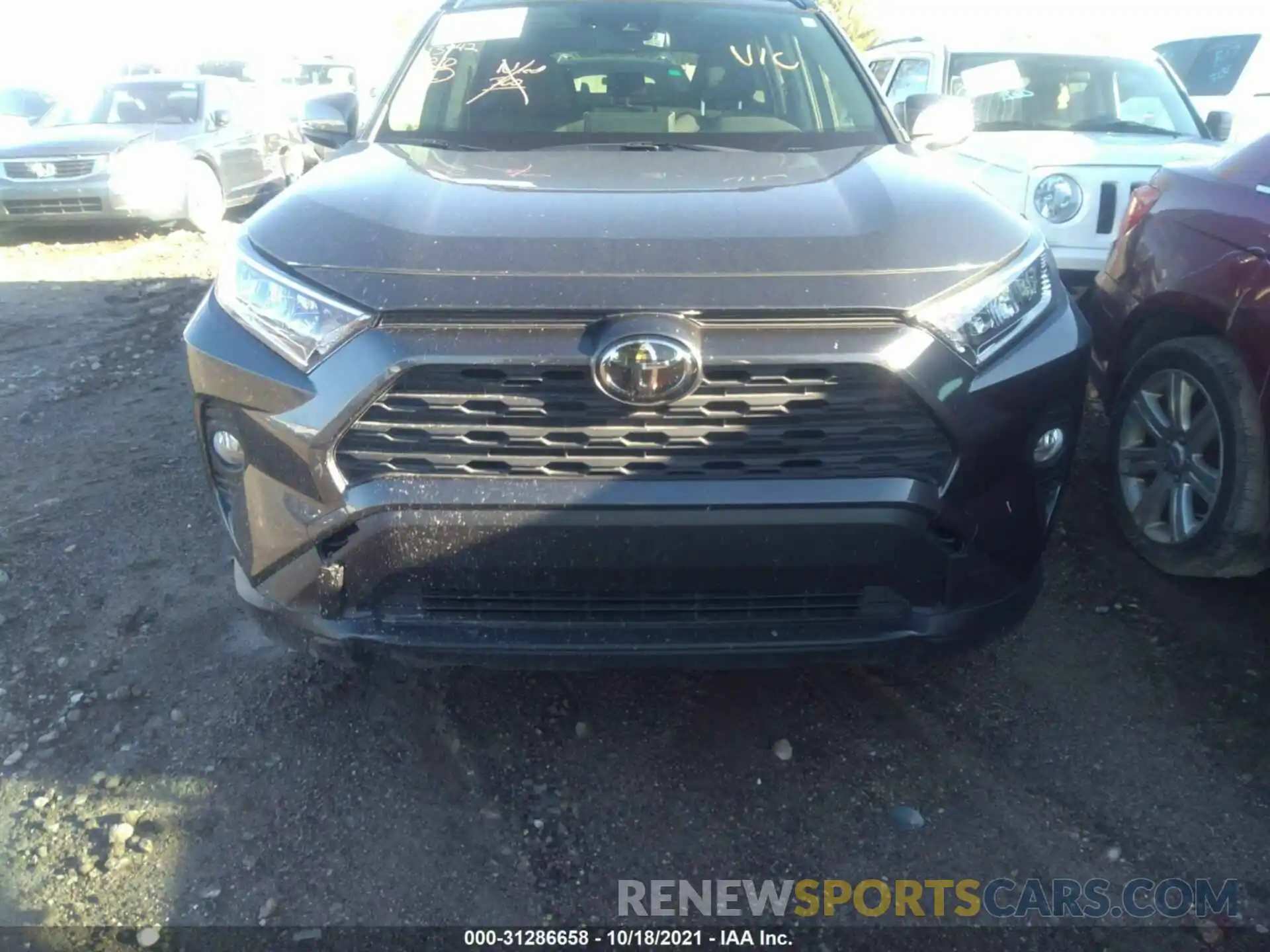 12 Photograph of a damaged car JTMP1RFV4KD521897 TOYOTA RAV4 2019