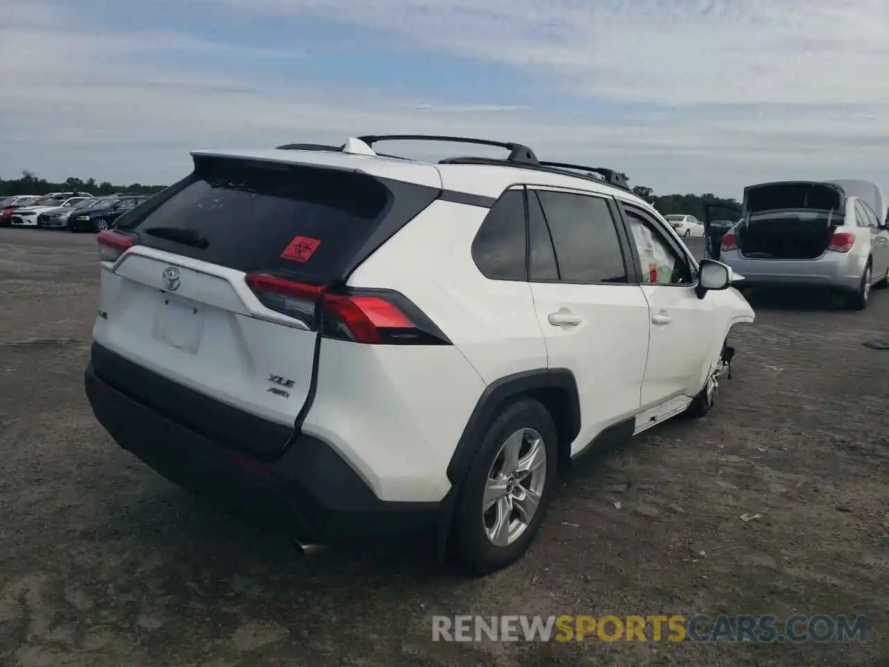 4 Photograph of a damaged car JTMP1RFV5KD008562 TOYOTA RAV4 2019