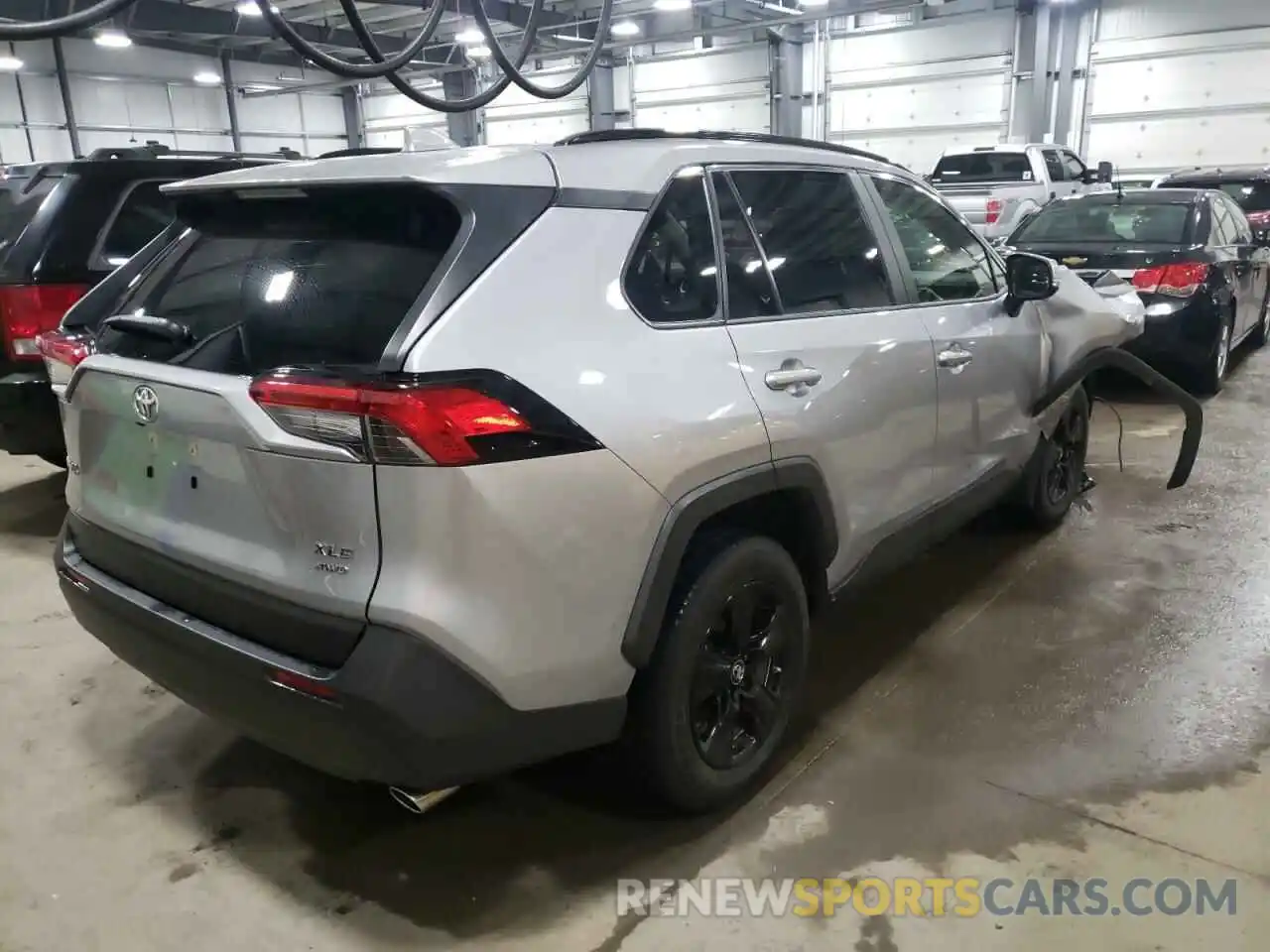 4 Photograph of a damaged car JTMP1RFV5KD012787 TOYOTA RAV4 2019