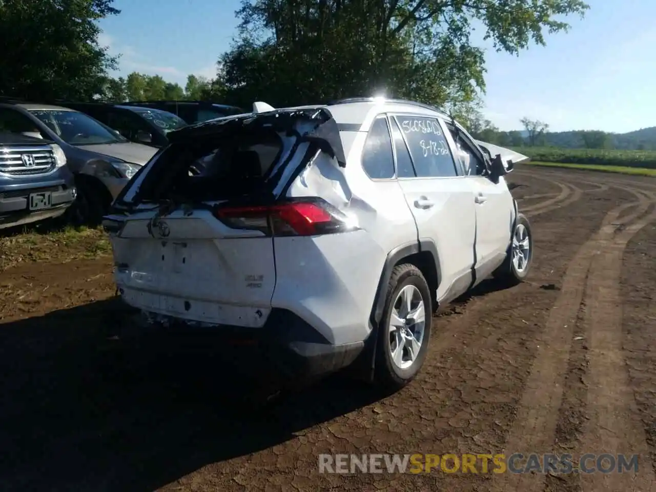 4 Photograph of a damaged car JTMP1RFV5KD020811 TOYOTA RAV4 2019