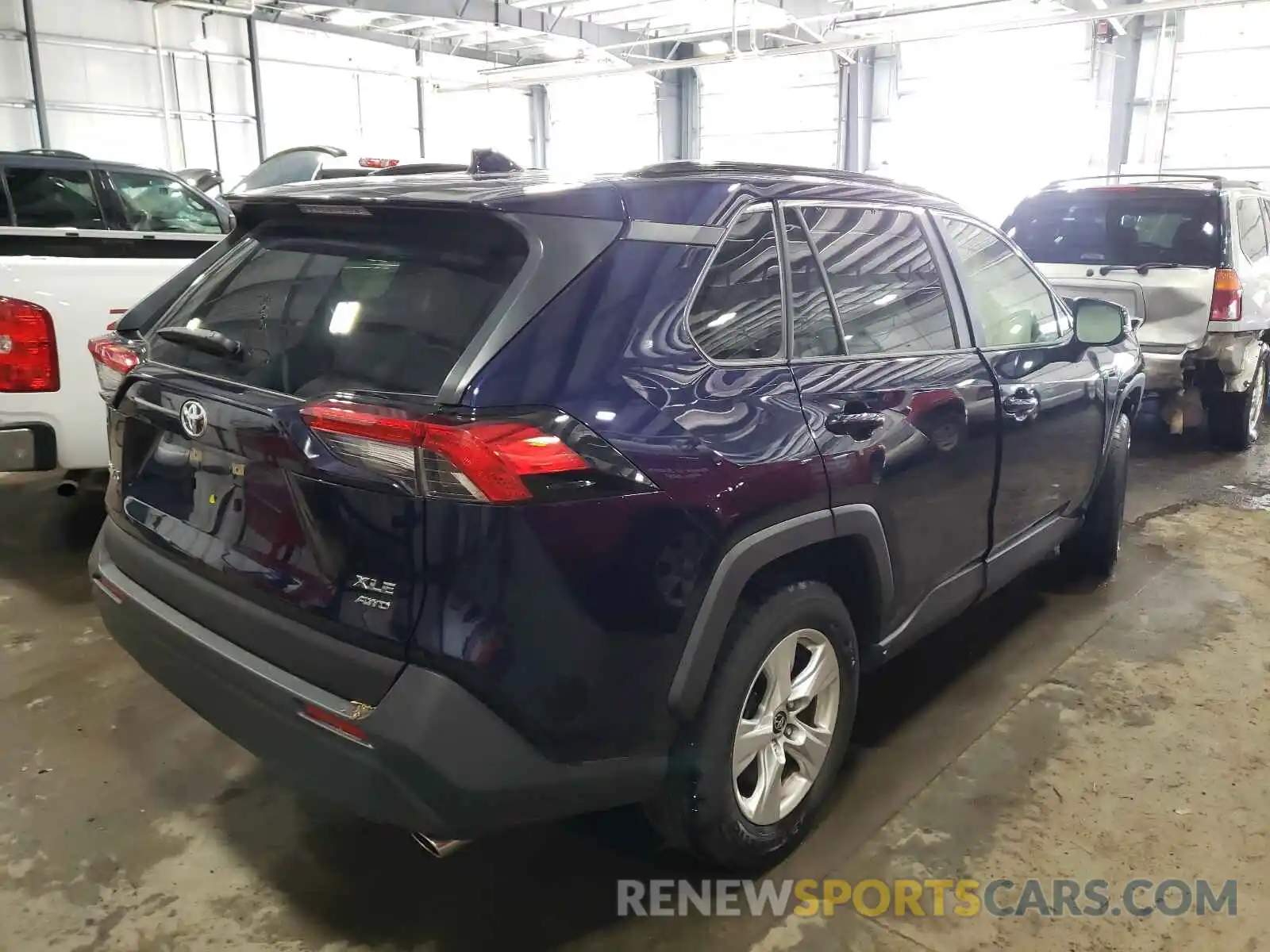 4 Photograph of a damaged car JTMP1RFV5KJ019420 TOYOTA RAV4 2019