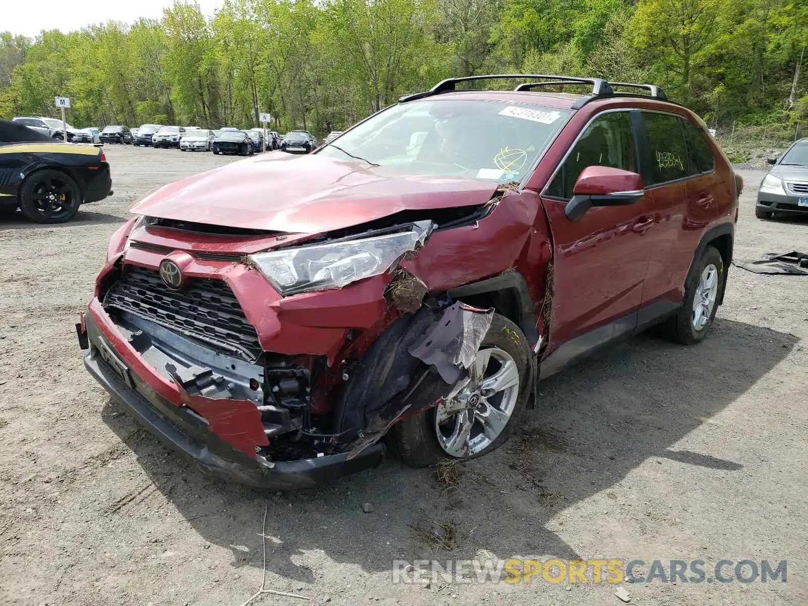 2 Photograph of a damaged car JTMP1RFV5KJ019949 TOYOTA RAV4 2019