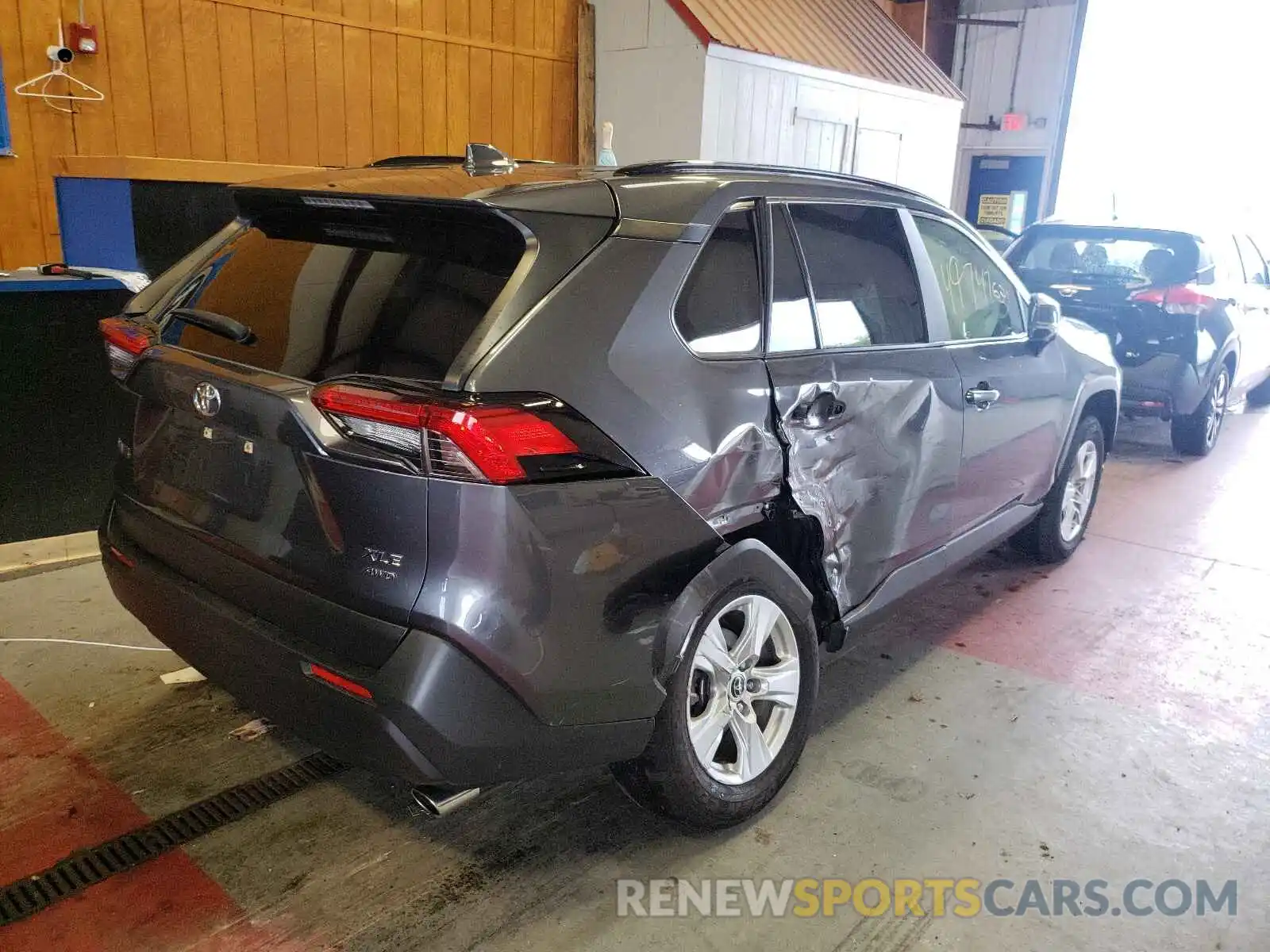 4 Photograph of a damaged car JTMP1RFV6KD017254 TOYOTA RAV4 2019