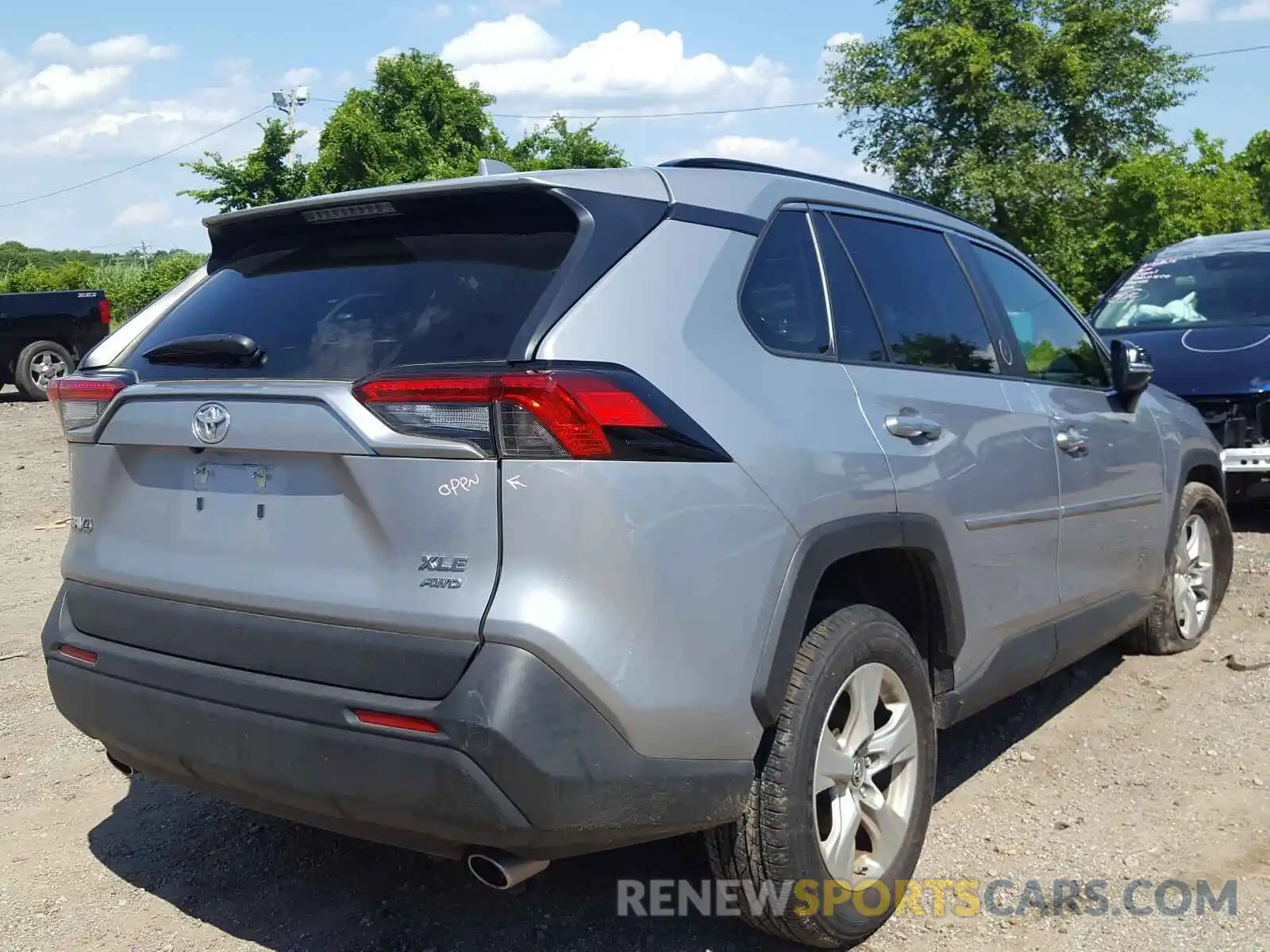 4 Photograph of a damaged car JTMP1RFV6KD516619 TOYOTA RAV4 2019