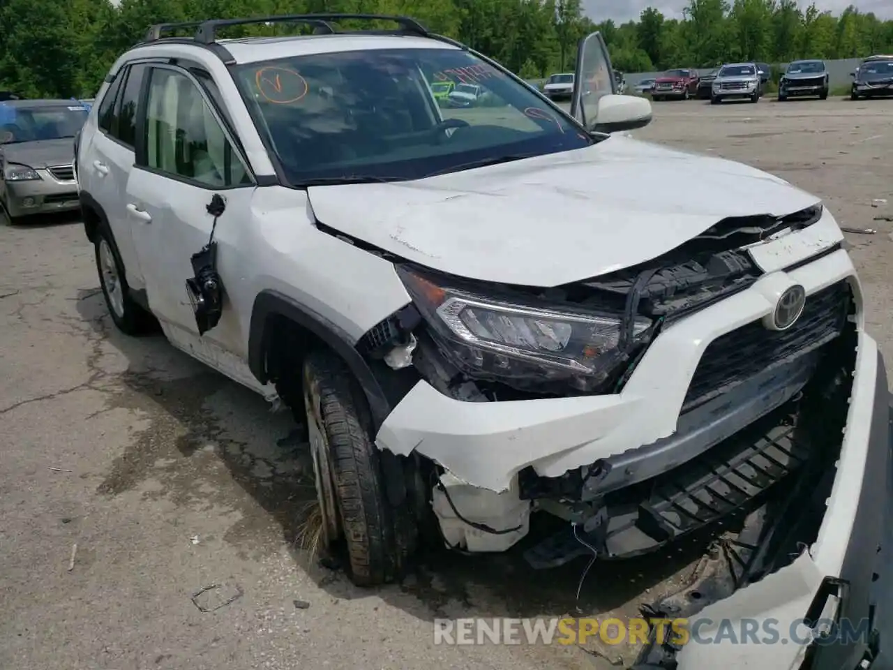 1 Photograph of a damaged car JTMP1RFV6KJ001315 TOYOTA RAV4 2019