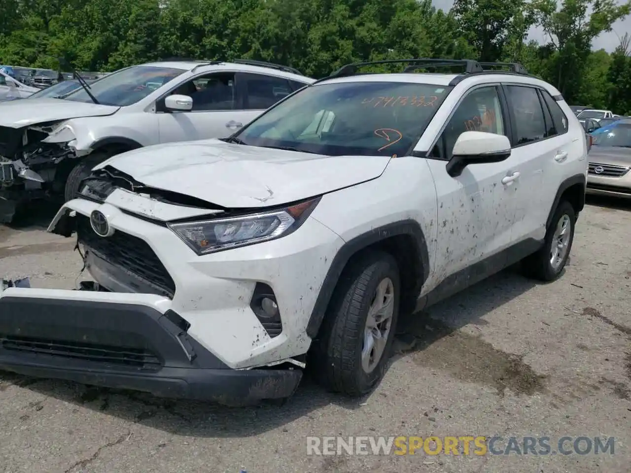 2 Photograph of a damaged car JTMP1RFV6KJ001315 TOYOTA RAV4 2019