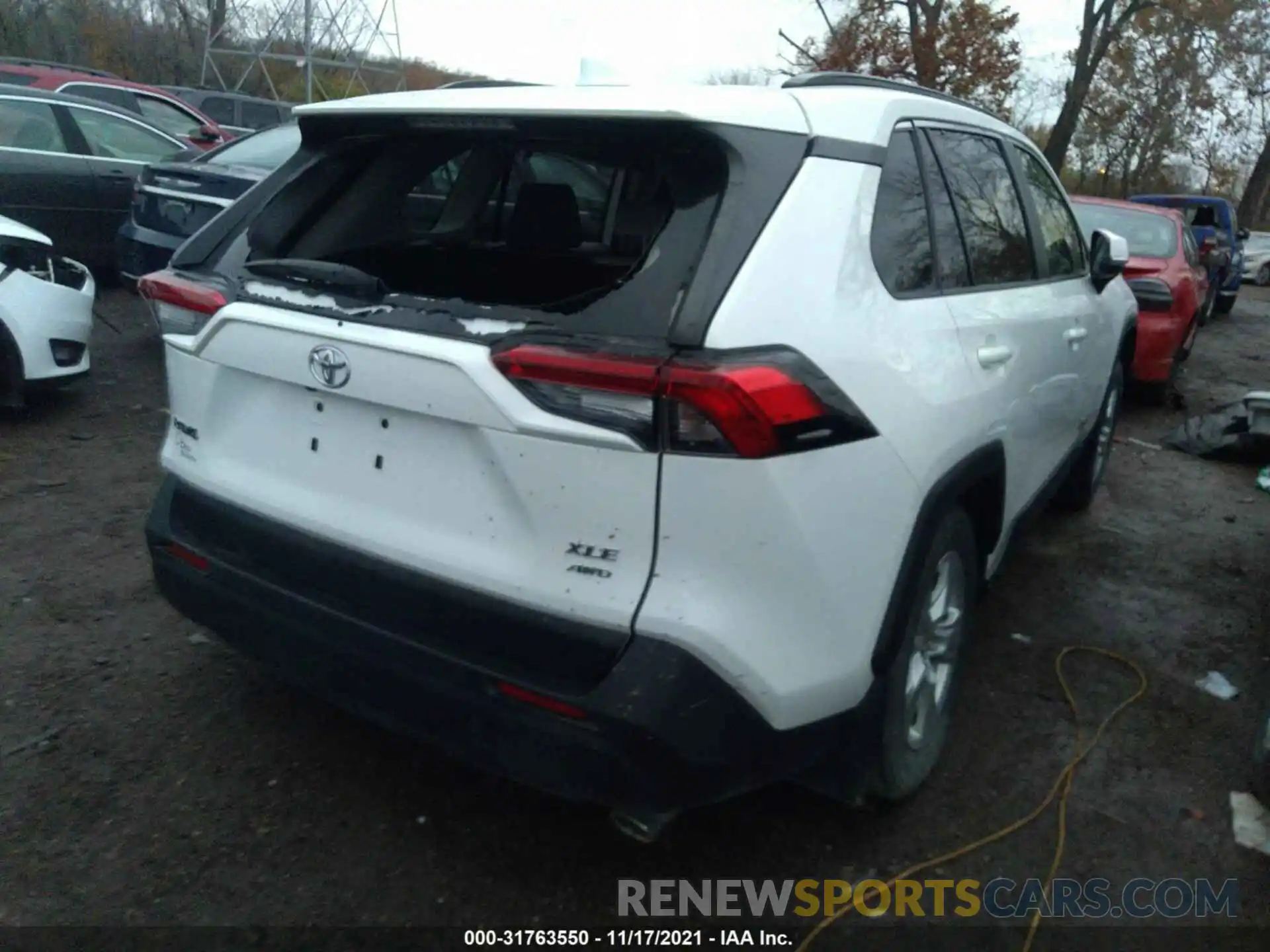 4 Photograph of a damaged car JTMP1RFV7KD036332 TOYOTA RAV4 2019