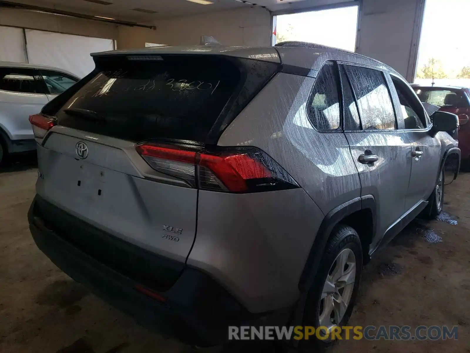 4 Photograph of a damaged car JTMP1RFV8KD013948 TOYOTA RAV4 2019