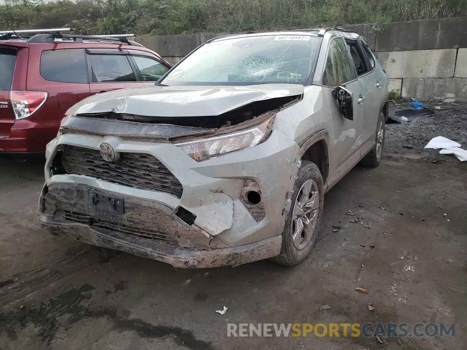 2 Photograph of a damaged car JTMP1RFV8KD022357 TOYOTA RAV4 2019