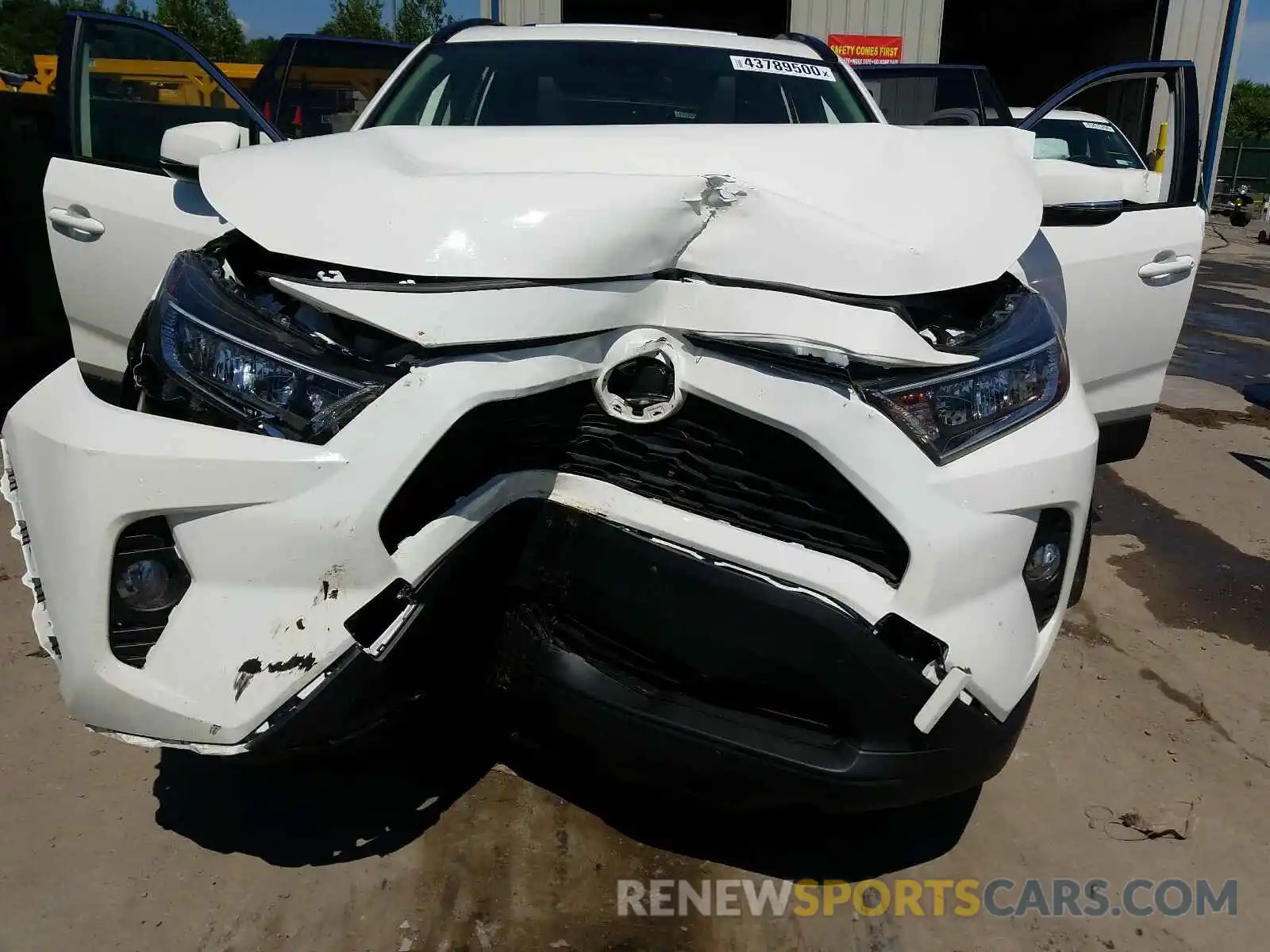 7 Photograph of a damaged car JTMP1RFV8KD023881 TOYOTA RAV4 2019