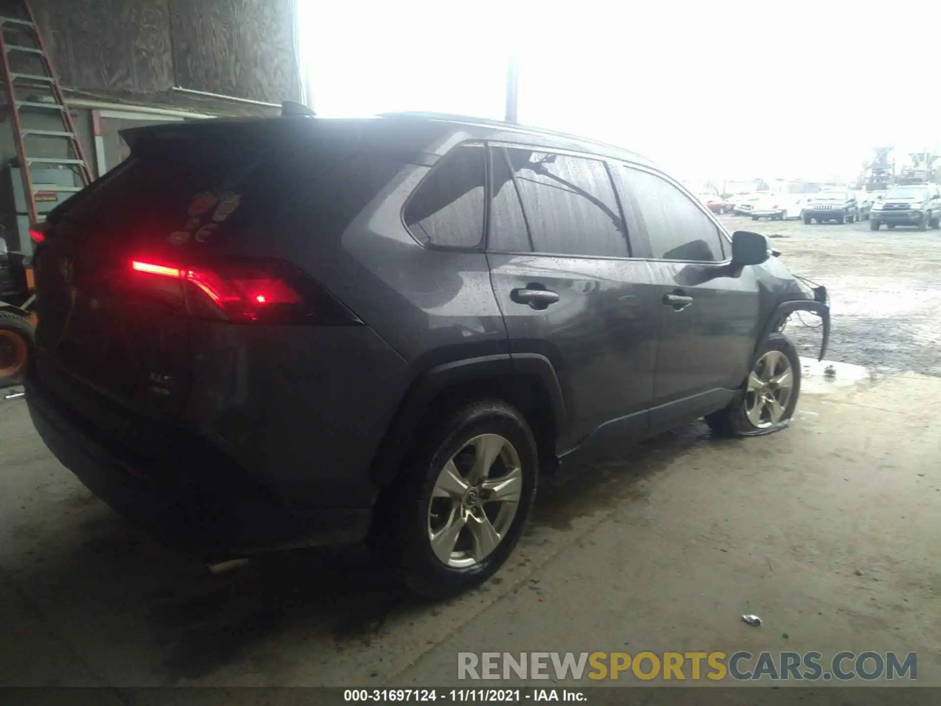 4 Photograph of a damaged car JTMP1RFV8KD024268 TOYOTA RAV4 2019