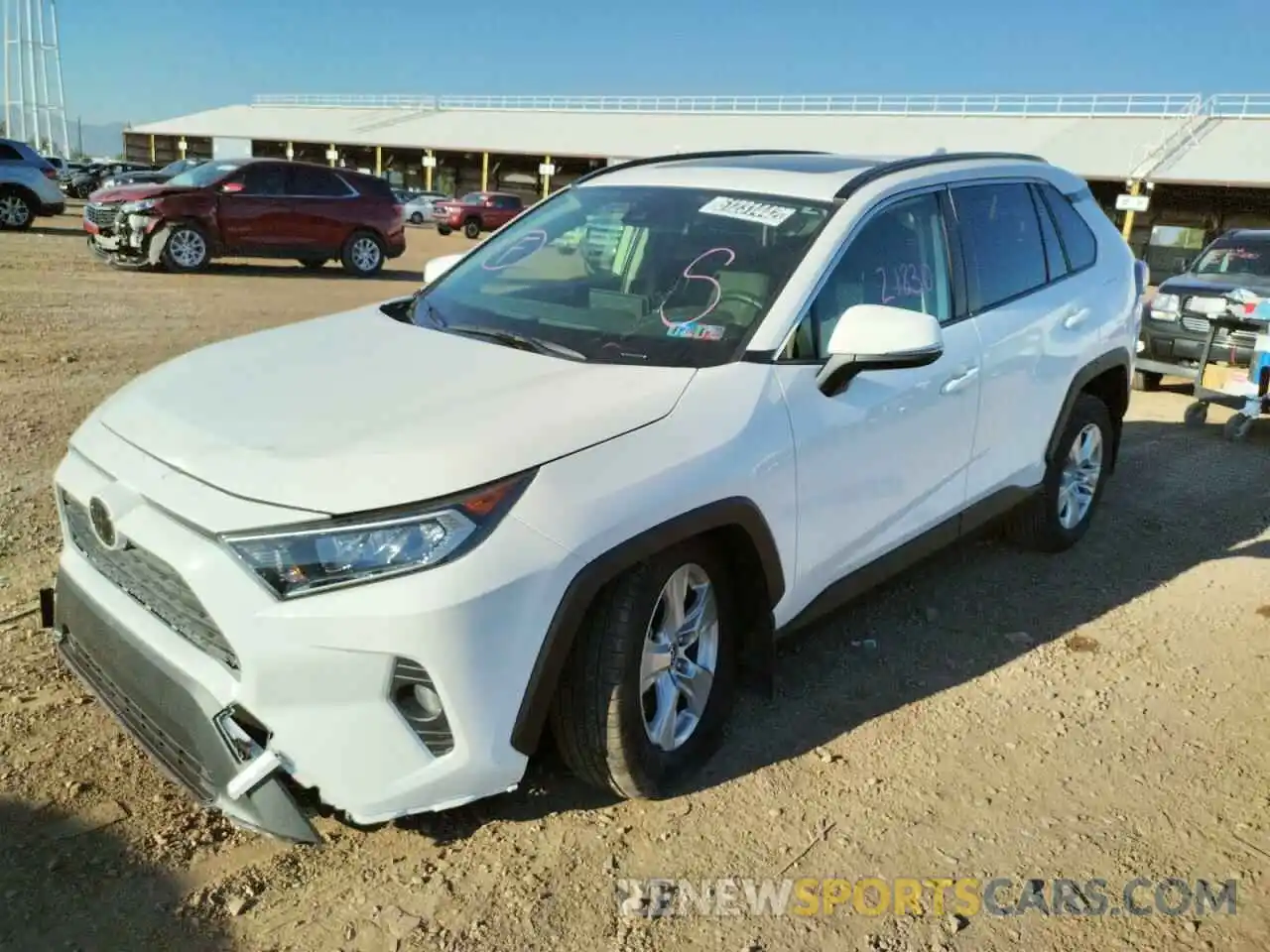 2 Photograph of a damaged car JTMP1RFV8KD031477 TOYOTA RAV4 2019