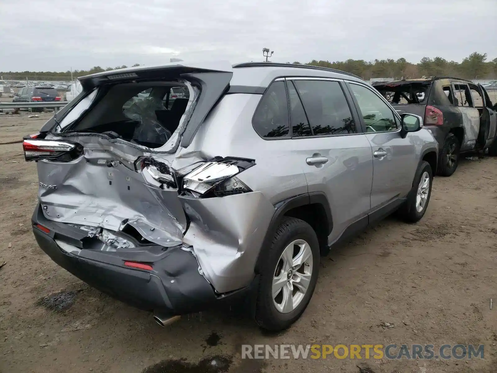 4 Photograph of a damaged car JTMP1RFV8KD508022 TOYOTA RAV4 2019