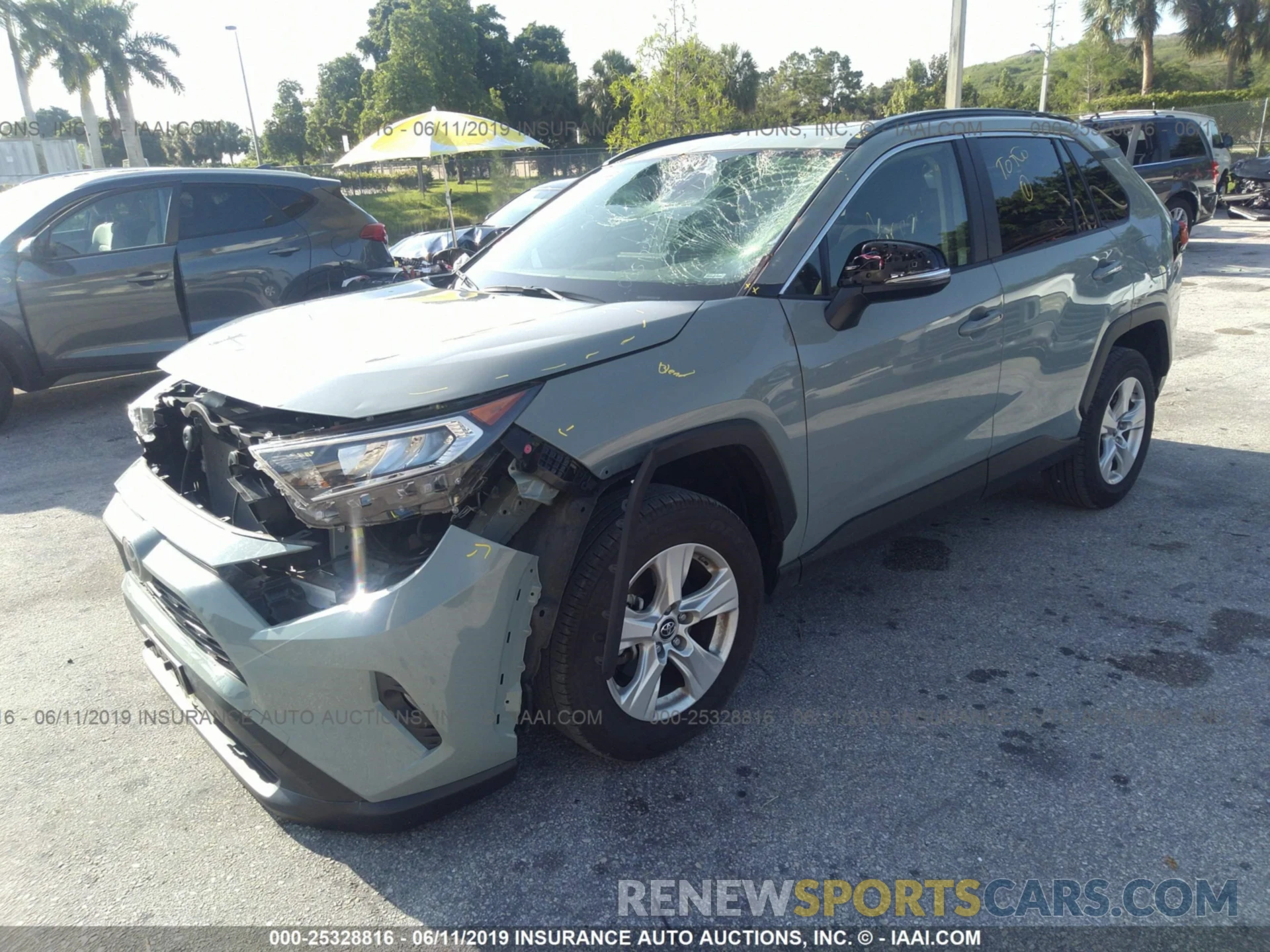 2 Photograph of a damaged car JTMP1RFV9KD003431 TOYOTA RAV4 2019