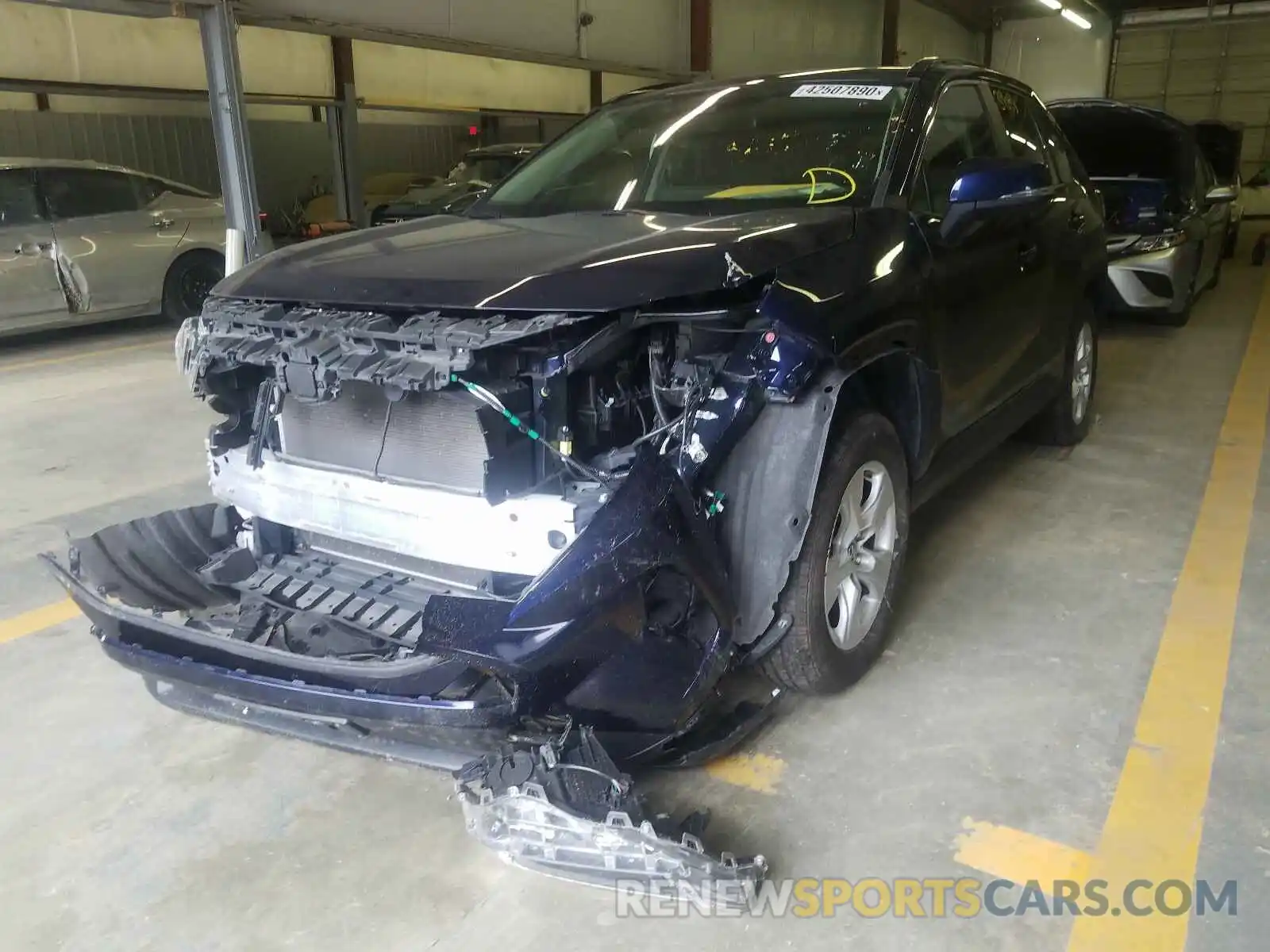 2 Photograph of a damaged car JTMP1RFV9KD012419 TOYOTA RAV4 2019