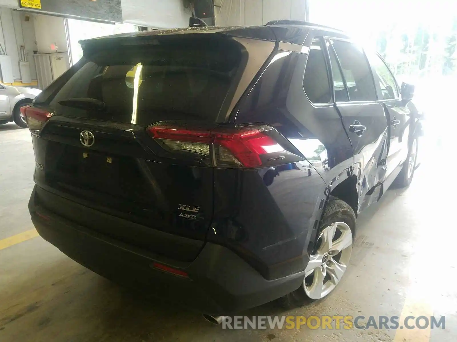 4 Photograph of a damaged car JTMP1RFV9KD012419 TOYOTA RAV4 2019