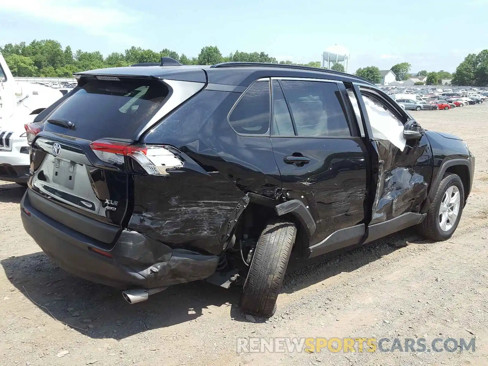 4 Photograph of a damaged car JTMP1RFV9KD018351 TOYOTA RAV4 2019