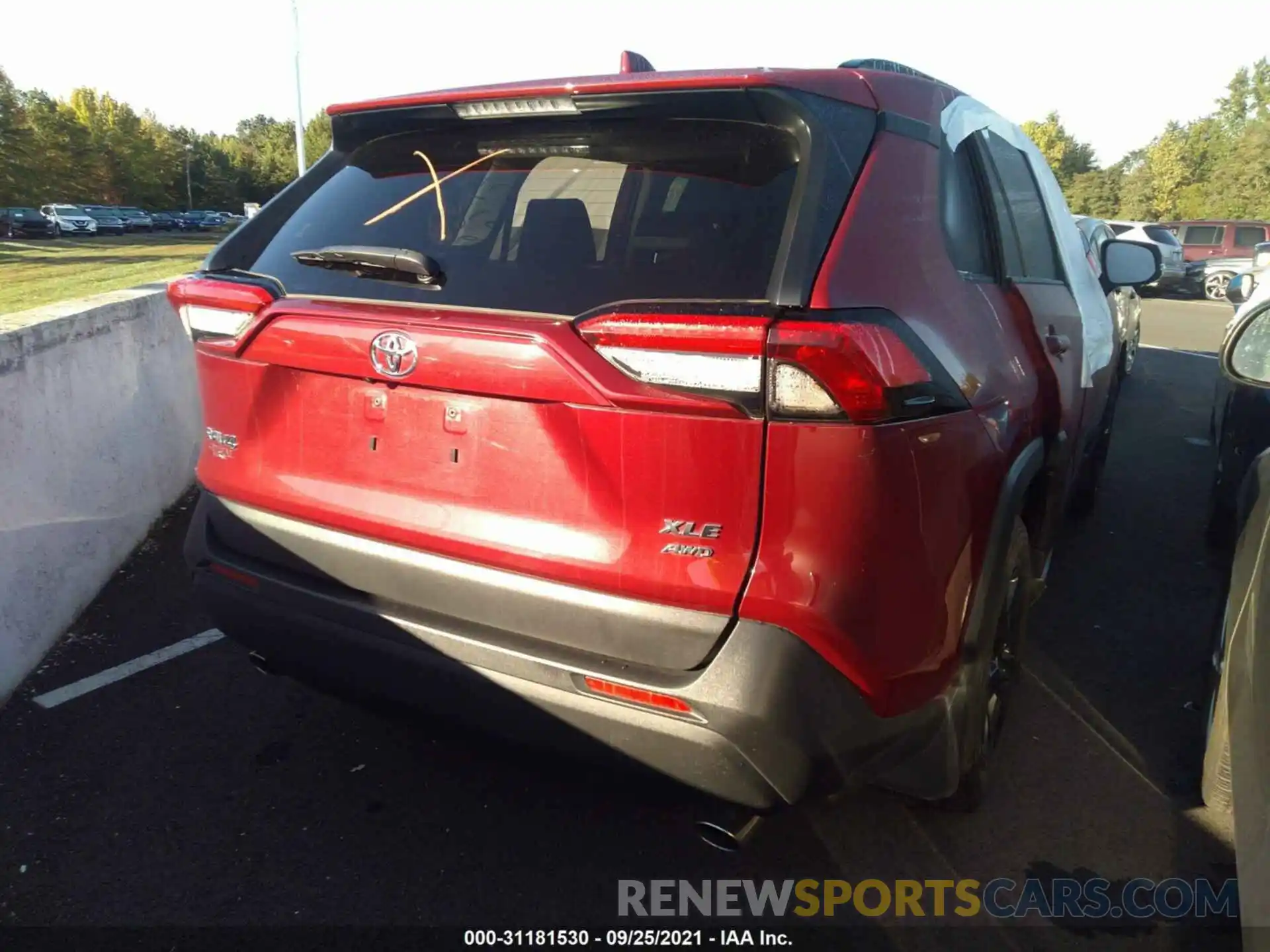 4 Photograph of a damaged car JTMP1RFV9KD033495 TOYOTA RAV4 2019