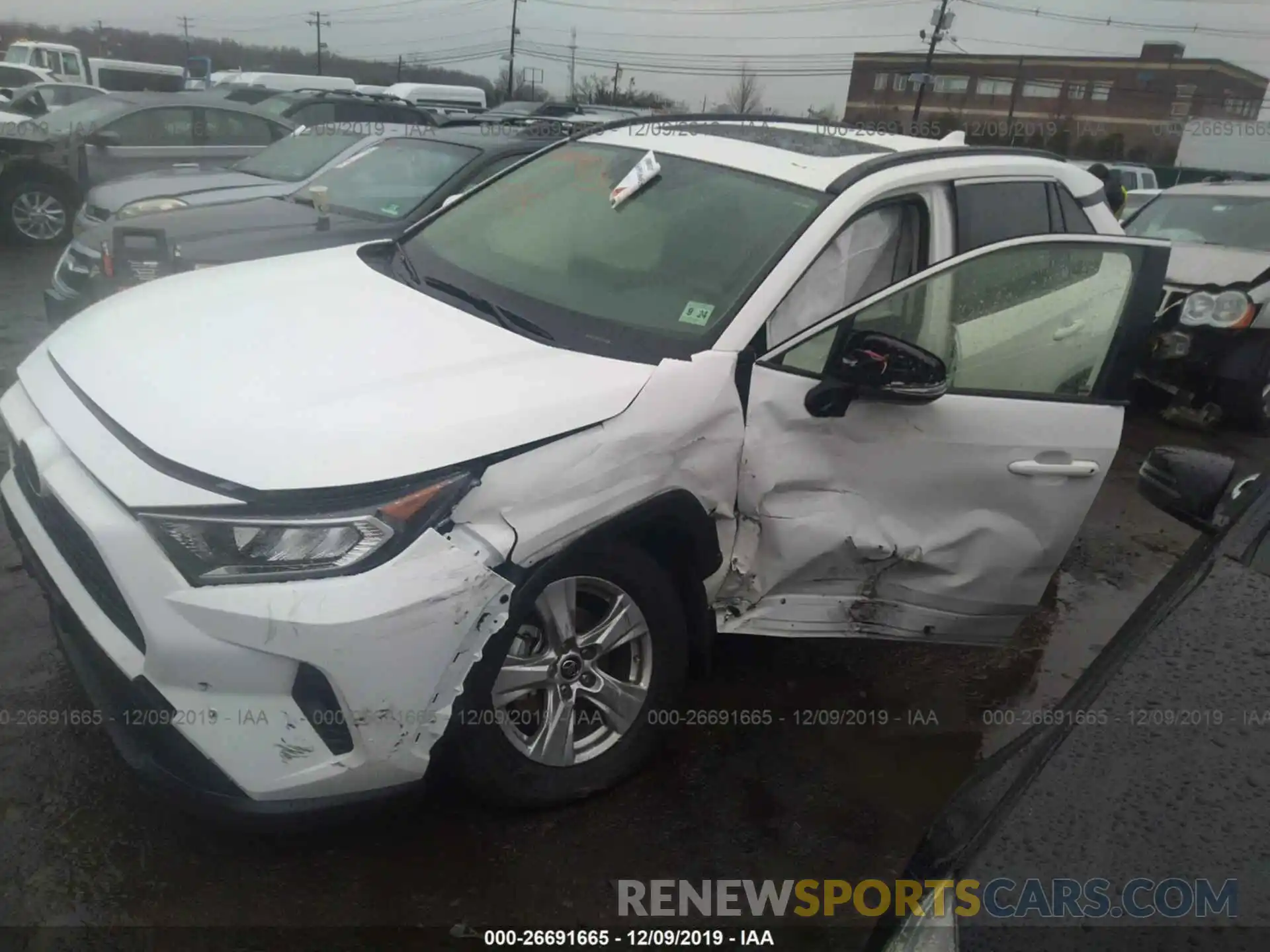 2 Photograph of a damaged car JTMP1RFV9KD038082 TOYOTA RAV4 2019