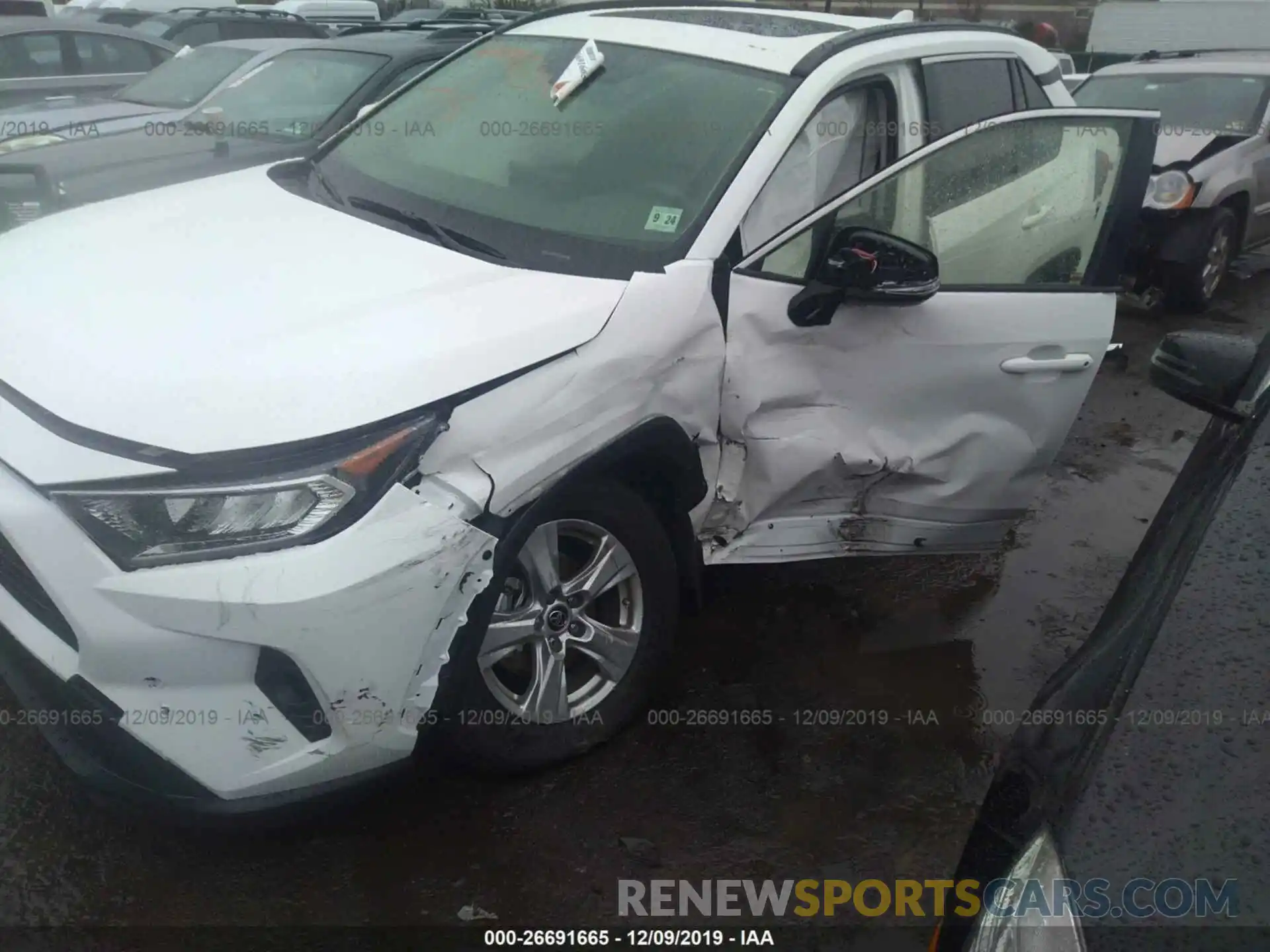 6 Photograph of a damaged car JTMP1RFV9KD038082 TOYOTA RAV4 2019