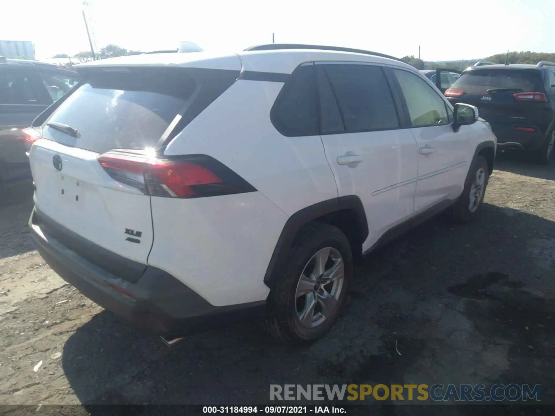 4 Photograph of a damaged car JTMP1RFV9KD039684 TOYOTA RAV4 2019