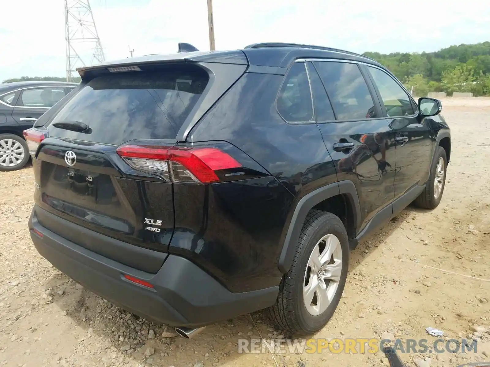 4 Photograph of a damaged car JTMP1RFV9KD502813 TOYOTA RAV4 2019