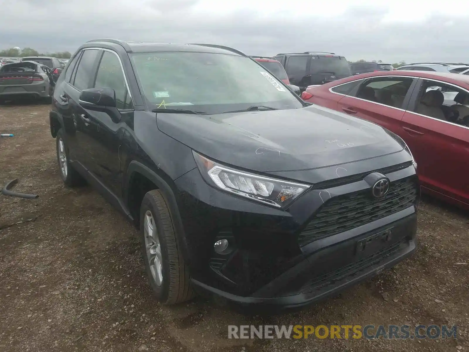 1 Photograph of a damaged car JTMP1RFVXKD006144 TOYOTA RAV4 2019