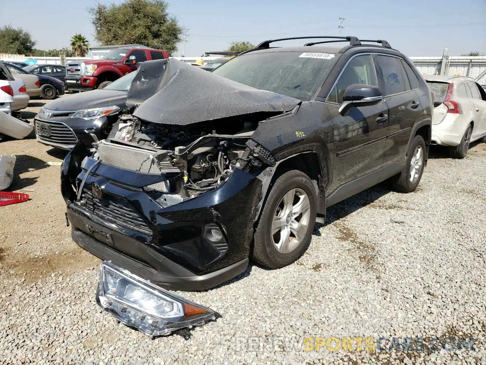 2 Photograph of a damaged car JTMP1RFVXKD008122 TOYOTA RAV4 2019