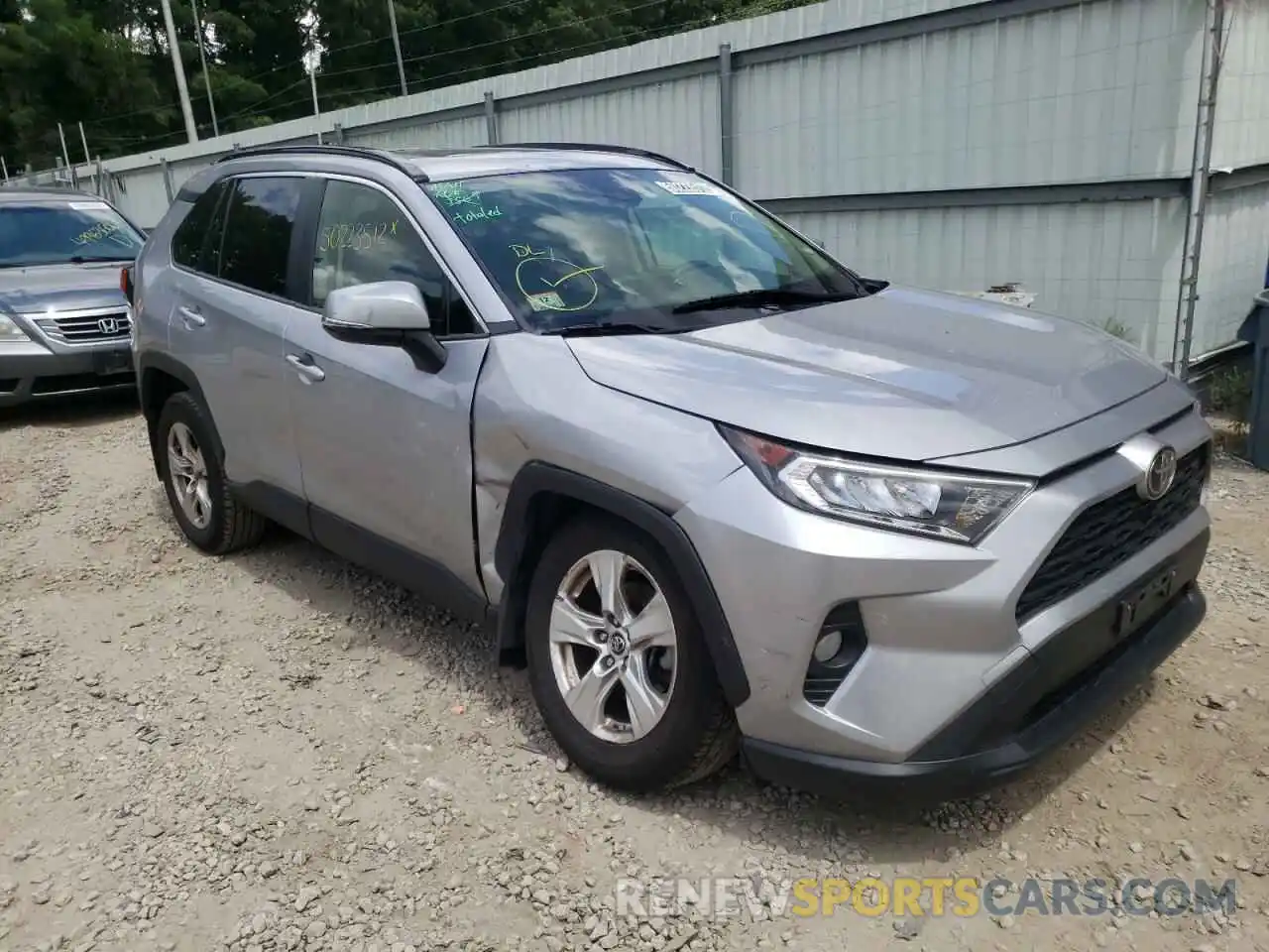 1 Photograph of a damaged car JTMP1RFVXKD024319 TOYOTA RAV4 2019