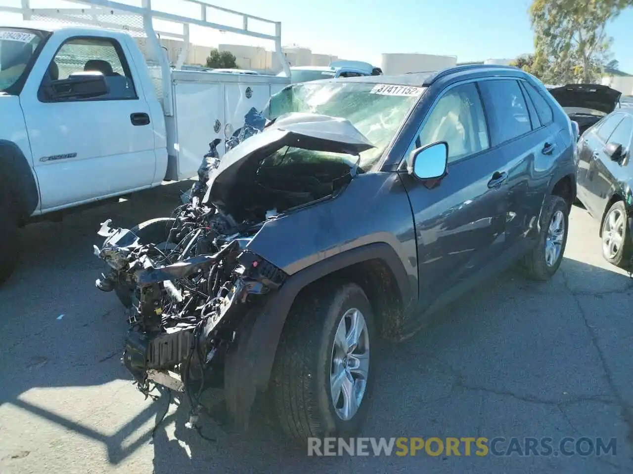 2 Photograph of a damaged car JTMP1RFVXKD030590 TOYOTA RAV4 2019