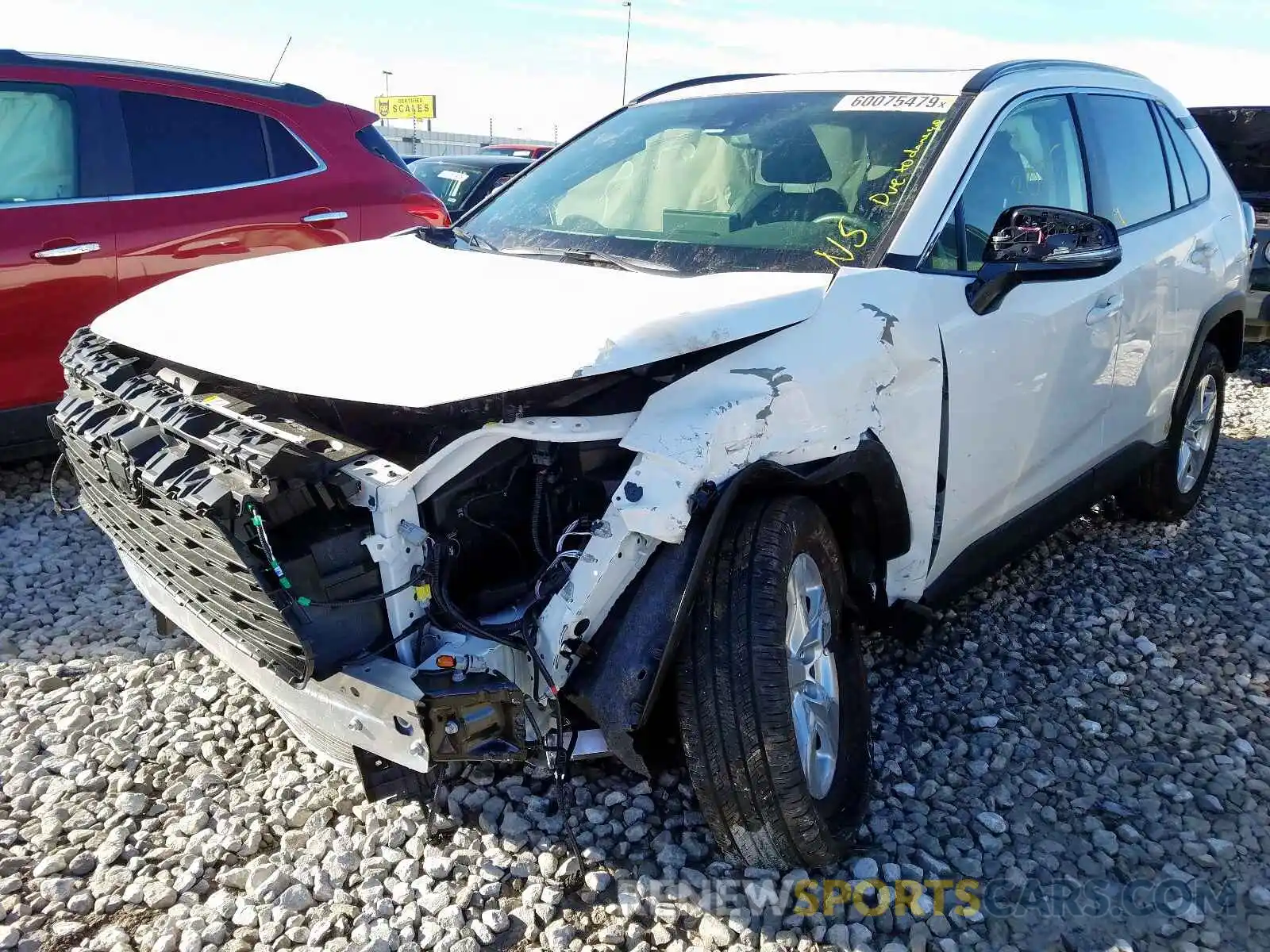 2 Photograph of a damaged car JTMP1RFVXKD036941 TOYOTA RAV4 2019