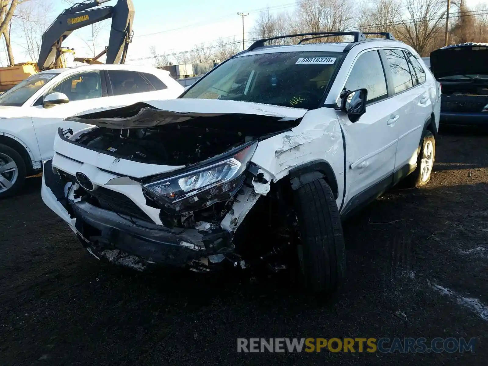 2 Photograph of a damaged car JTMP1RFVXKD040908 TOYOTA RAV4 2019