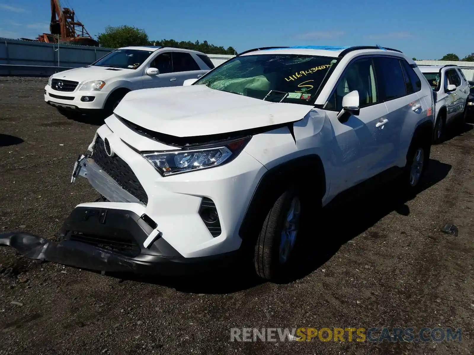 2 Photograph of a damaged car JTMP1RFVXKD521144 TOYOTA RAV4 2019