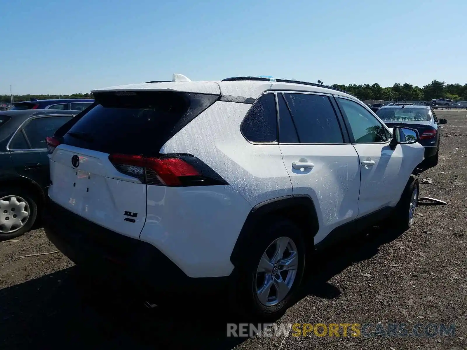 4 Photograph of a damaged car JTMP1RFVXKD521144 TOYOTA RAV4 2019