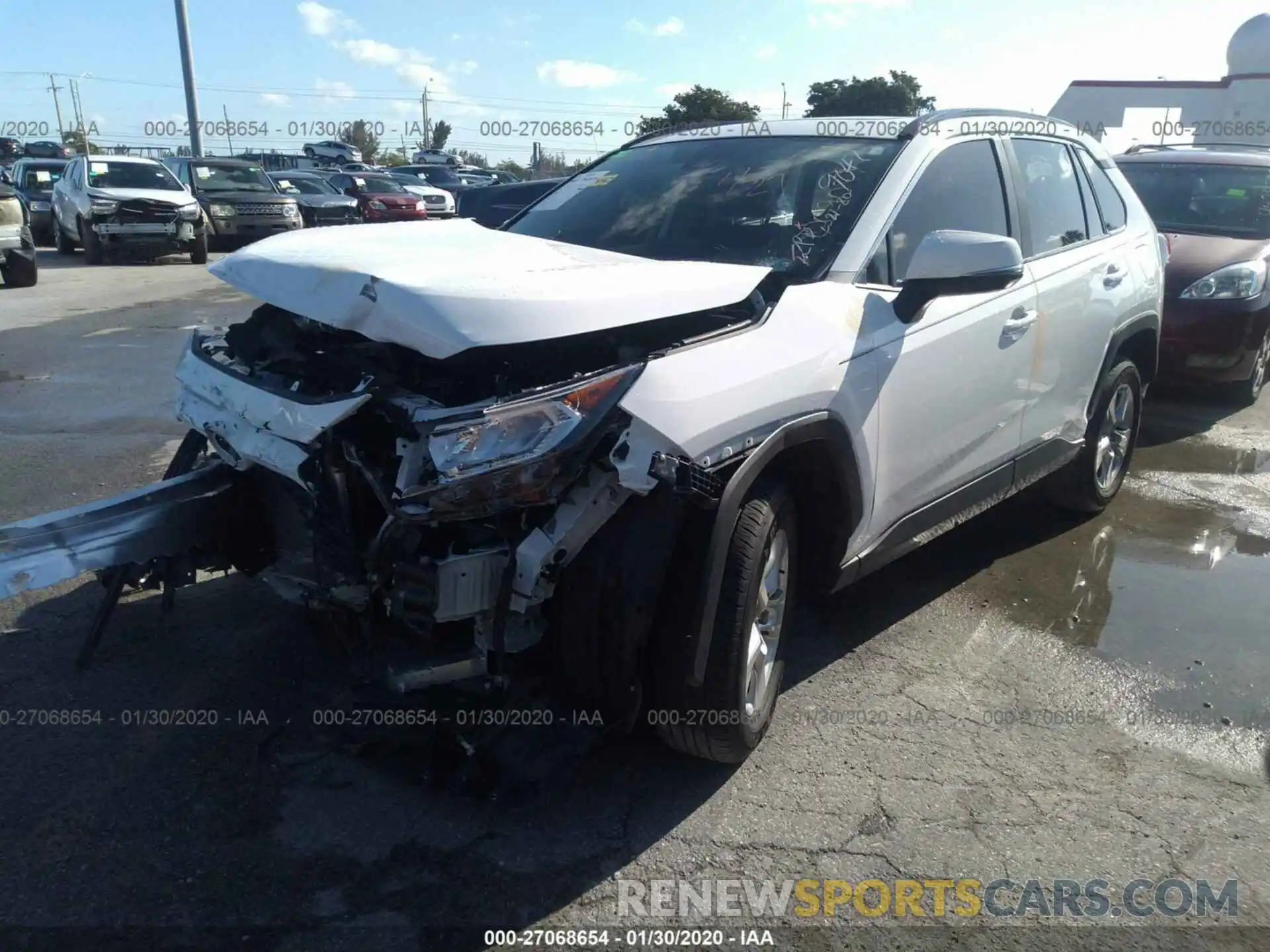 2 Photograph of a damaged car JTMW1RFV0KD009047 TOYOTA RAV4 2019