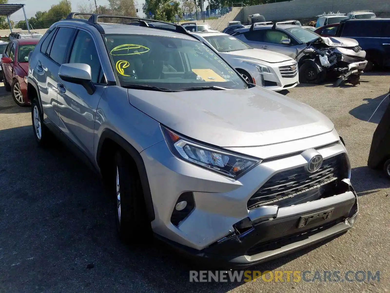 1 Photograph of a damaged car JTMW1RFV0KD017374 TOYOTA RAV4 2019