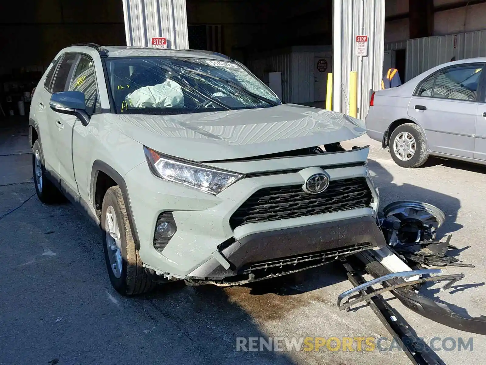 1 Photograph of a damaged car JTMW1RFV0KD031193 TOYOTA RAV4 2019