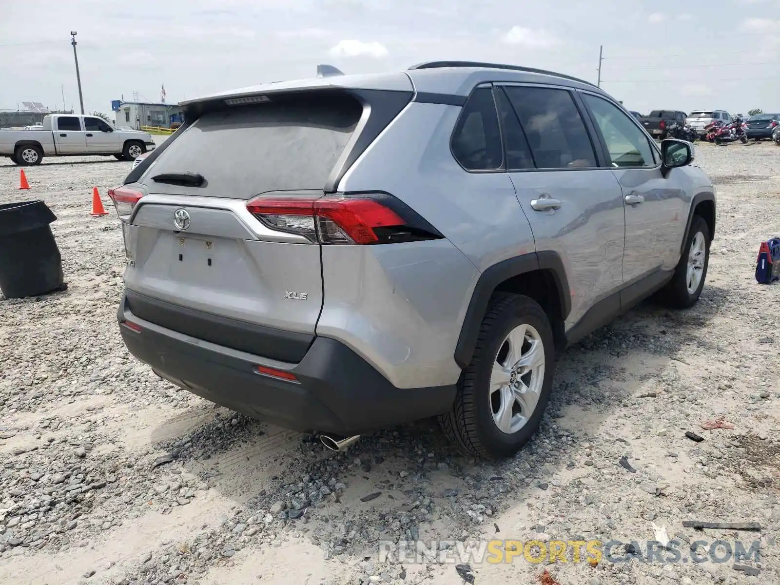 4 Photograph of a damaged car JTMW1RFV2KD002097 TOYOTA RAV4 2019