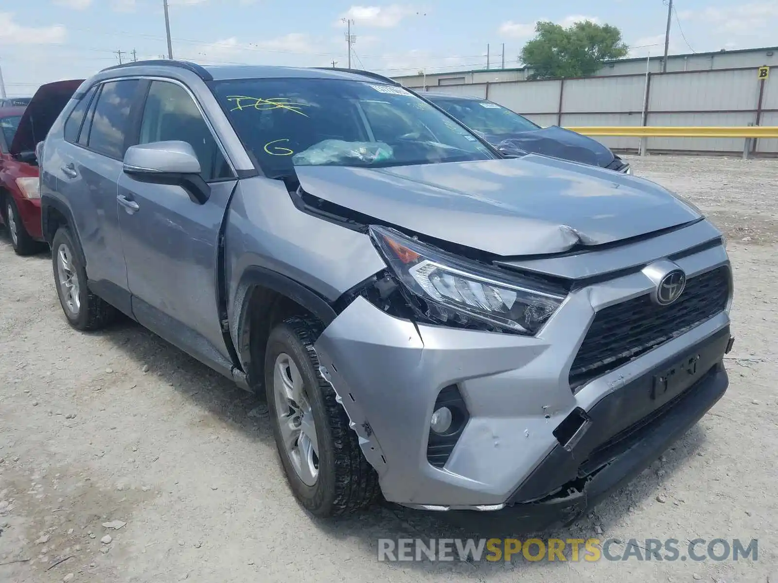 1 Photograph of a damaged car JTMW1RFV2KD501904 TOYOTA RAV4 2019