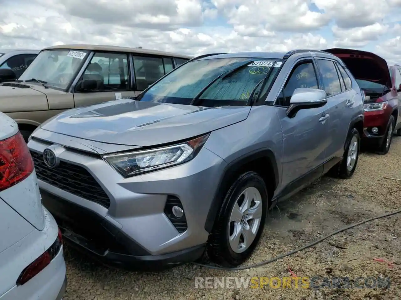 2 Фотография поврежденного автомобиля JTMW1RFV3KD029969 TOYOTA RAV4 2019